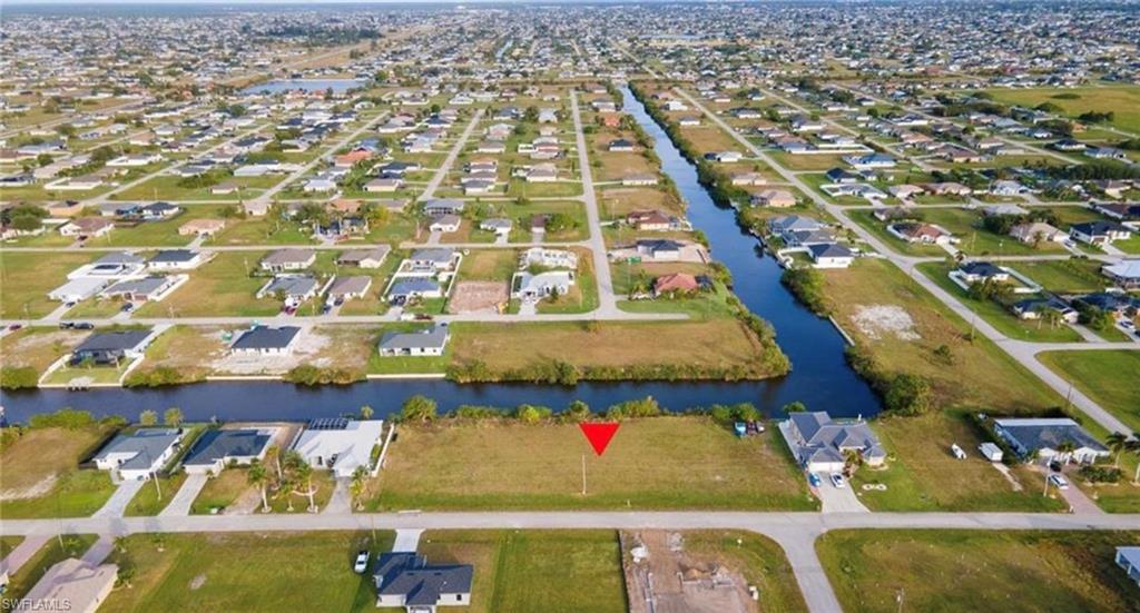 Build your dream home on this beautiful freshwater canal-front lot in NW Cape Coral! Offering approximately 0.25 acres, this cleared waterfront property is ready for you to bring your vision to life. Enjoy peaceful water views right from your backyard while creating a home designed around the Florida lifestyle. Located in a growing area of Cape Coral with new construction nearby, this lot offers a great opportunity to build your primary residence, vacation home, or investment property. Secure your piece of waterfront Cape Coral and start planning your future home today!