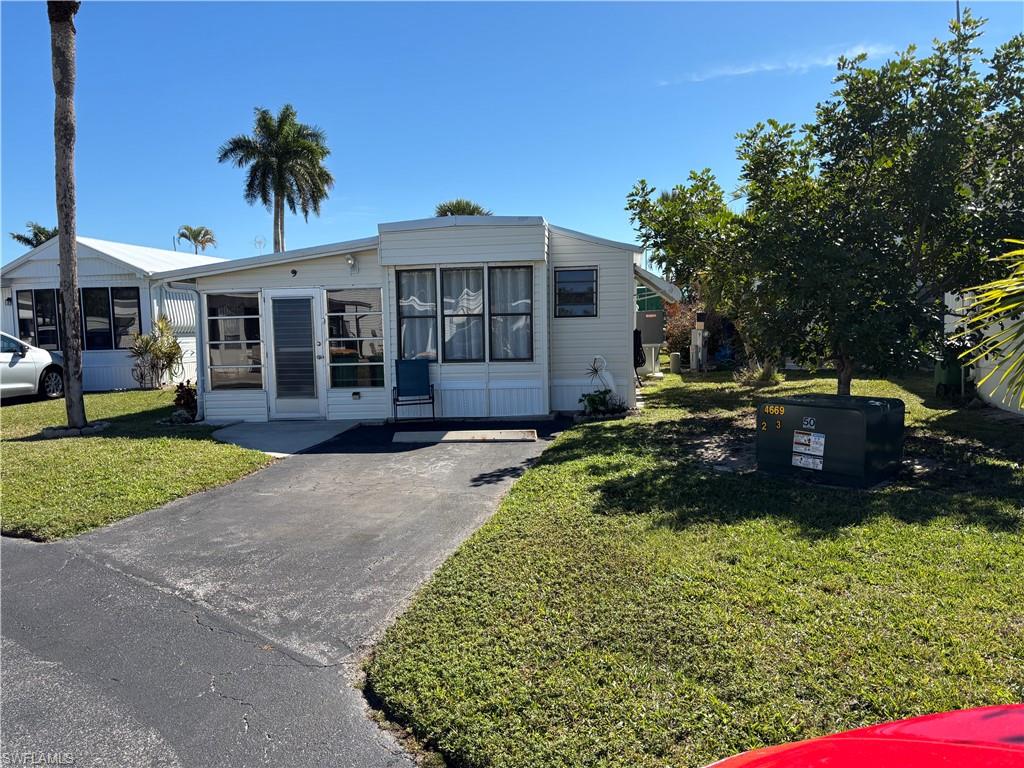 AFFORDABLE PRICE ON THIS DELIGHTFUL WELL MAINTAINED TURNKEY HOME IN HIGHLY DESIRABLE ENCHANTING SHORES CO-OP. SPARKKLING CLEAN AND WELL CARED FOR THIS WINTER GET AWAY FEATURES A RECENT HVAC UNIT AND LOVELY MANICURED YARD. CHARMING DECOR AFFORDS A COMFORTABLE MOVE IN READY HOME IN ONE OF THE MOST AFFORDABLE 55 PLUS PARKS IN NAPLES. ENJOY THE MULTITUDE OF AMENETIES AND ACTIVITIES INCLUDING GULF OF AMERICA ACCESS. ENCHANTING SHORES IS LOCATED CLOSE TO POPULAR MARCO ISLAND AND DOWNTOWN NAPLES AND IS A MINUTE DRIVE TO A LARGE VARIETY OF SHOPS, EATERIES, SERVICES AND SITES. VISIT A DIFFEDRENT BEAUTIFUL BEACH EACH DAY AND EXPERIENNCE ALL THAT SOUTHWEST FLORIDA HAS TO OFFER. Seller plans on leaving the 2012 Toyota Camry with the property. Vehicle is in very good condition mechanically with very nice appearance.
