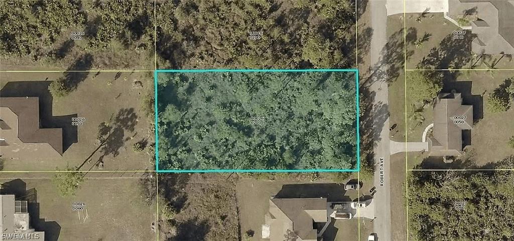 Prime 0.50-acre homesite in Lehigh Acres offering an excellent opportunity to build your future home. With ample room for a spacious residence, pool, garage, and outdoor entertaining area, this property gives you the flexibility to create the home you've been envisioning. Conveniently situated close to shopping, restaurants, schools, and major roadways, this lot combines space, convenience, and long-term potential in one of Southwest Florida's growing communities.