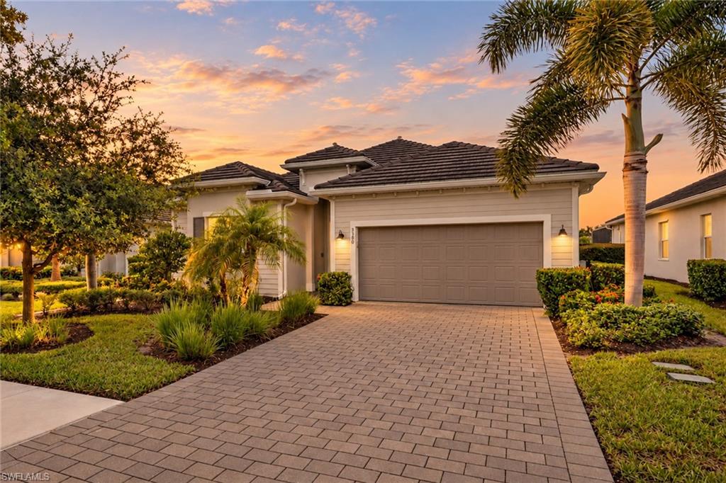 Experience resort-style living at its finest in The National Golf & Country Club at Ave Maria! Offered fully furnished with a golf cart and golf membership included, this beautifully designed Maria floor plan features 3 spacious bedrooms plus a versatile den, 3 full bathrooms, and 2,247 square feet of comfortable living space. The inviting open-concept layout offers soaring ceilings, a thoughtfully designed split-bedroom floor plan, and plenty of space for entertaining. The spacious kitchen features a center island, ample cabinetry, and a walk-in pantry, seamlessly connecting to the main living and dining areas. The primary suite offers a relaxing retreat with a generous walk-in closet and private bathroom featuring dual sinks and a walk-in shower. Step outside to the screened lanai and enjoy peaceful lake and golf course views, complete with automatic hurricane shutters for added convenience and storm protection. Additional highlights include a dedicated laundry room and attached two-car garage. Located within a gated golf community, residents enjoy access to an 18-hole championship golf course, resort-style pool, fitness center, pickleball, tennis, clubhouse, dining, and more. Conveniently located near Ave Maria's charming town center, shopping, restaurants, and everyday conveniences. Move right in and embrace the Southwest Florida lifestyle with furnishings, golf cart, and golf membership included!