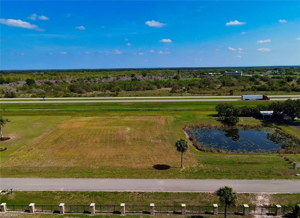 Welcome to 4005 Oak Haven Dr – a rare opportunity to own a stunning 2-acre cleared lot in a serene, upscale community that offers the perfect blend of quiet country charm and convenient city access. Nestled in a peaceful neighborhood, this spacious homesite features a picturesque private lake right on the property – ideal for enjoying nature, relaxing, or even planning your dream backyard oasis. With the land already cleared, it’s ready for your custom home, workshop, or retreat. Located just minutes from local shops, dining, and schools, you’ll enjoy the convenience of being close to town without sacrificing tranquility. Plus, with easy highway access, you're within a comfortable drive of Miami, making this location ideal for weekend escapes or full-time living. Whether you’re looking to build your dream estate or invest in a growing area, this property offers space, beauty, and unbeatable potential.