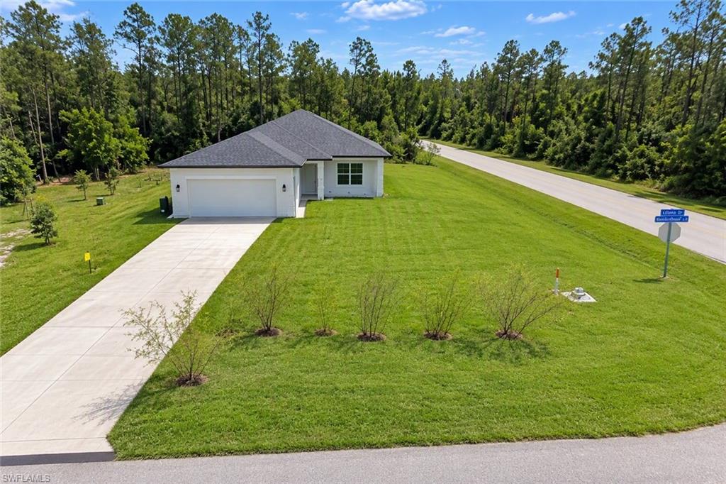 Available immediately for annual rent, this brand-new 2026 construction in Lehigh Acres offers modern living in a peaceful setting. Never lived in, the home features 3 bedrooms, 2 bathrooms, and nearly 1,650 sq ft of thoughtfully designed living space. The open-concept layout showcases a spacious kitchen with a large island—ideal for cooking, gathering, and entertaining. Situated on a 10,000 sq ft lot, the property provides generous outdoor space while maintaining convenient access to local amenities. Additional highlights include Laundry room, Two-car attached garage, Bright, modern finishes throughout A perfect opportunity for anyone seeking a fresh, move-in-ready home in a growing community.