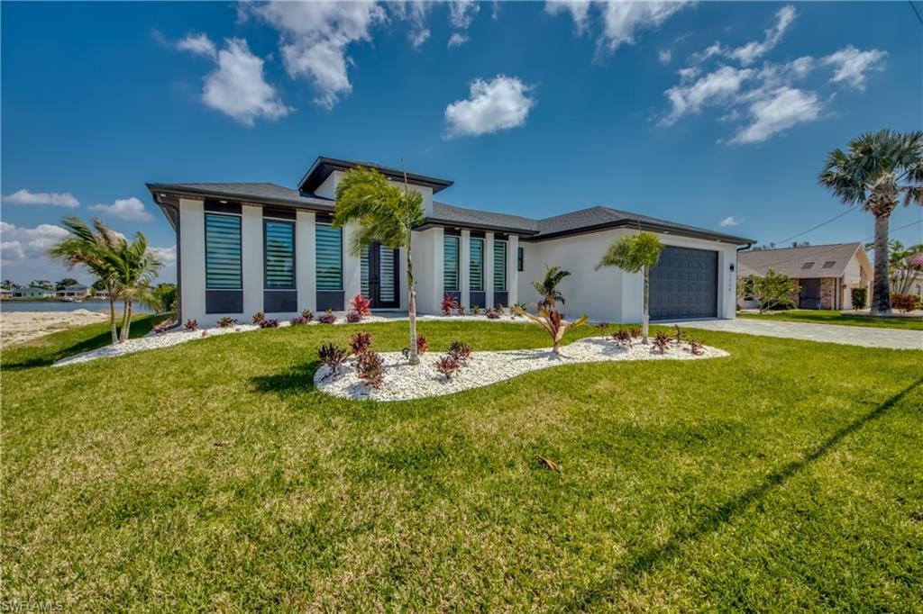 Welcome to Exceptional Lakefront Living
This stunning residence on Lake Weatherly is meticulously designed to impress from the very first step inside. With approximately 2,200 square feet of living space, the home features four spacious bedrooms and four modern bathrooms. The living room and lanai, complete with a cozy fireplace and stylish, comfortable furnishings, offer breathtaking views across Weatherly Lake, creating the perfect setting for relaxation and entertaining guests.
Gourmet Kitchen for Entertaining
The open-concept kitchen is ideally suited for hosting gatherings, boasting bar seating, custom cabinetry, and top-of-the-line stainless steel appliances. Its layout and amenities make entertaining both effortless and enjoyable.
Outdoor Oasis
Spend countless hours at the pool, which is enclosed by a screened lanai large enough to accommodate outdoor dining and lounging. The outdoor bar area enhances the space, making it perfect for both daytime relaxation and evening festivities.
Private Dock and Scenic Views
The property also includes a private dock, offering the perfect spot to enjoy the beauty of sunrise over the water. 
This luxurious home is just a few blocks away from local shops, waterfront dining, and entertainment venues, ensuring convenience and a vibrant lifestyle.
Your Paradise Awaits
Experience the best of luxury living with this Home on Lake Weatherly — your personal paradise is ready to welcome you.