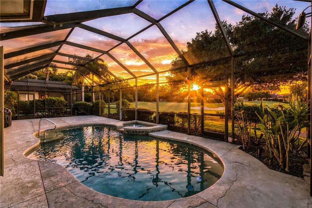 Discover refined Florida living in this one-of-a-kind Arthur Rutenberg residence, showcasing gorgeous panoramic golf course views of the seventh hole, beautifully manicured landscaping, and exceptional indoor-outdoor living. Recent updates include a 2026 roof, 2025 air conditioner, fresh interior paint and new carpet in all bedrooms. Featuring three bedrooms plus a den and two baths, the thoughtfully designed layout offers inviting gathering spaces alongside private retreats. The kitchen features a center island, granite countertops, stainless steel appliances, recessed lighting and a pantry. In the primary suite, enjoy a spacious walk-in closet with updated shelving and a well-appointed bath with dual sinks, granite countertops, a separate soaking tub, and a huge walk-in shower with a frameless glass door. Go outside to the sparkling pool and spa, overlooking the golf course and lush greenery, providing a beautiful backdrop for relaxing or entertaining. Additional highlights include plantation shutters throughout, full storm protection and a generous two-car garage with built-in shelving. A beautifully manicured front yard completes the impressive curb appeal. Simply move in and start enjoying the Florida lifestyle. Residents enjoy access to a championship 18-hole Arthur Hills–designed golf course, and a clubhouse with fine and casual dining. Additional amenities include tennis, pickleball and bocce courts, a resort-style pool, a full-service spa and fitness center, steam rooms, a library, playground and a vibrant calendar of social events, all just minutes from RSW Airport, Gulf beaches, shopping and dining. Move-in ready and masterfully updated, this tech-enhanced sanctuary offers privacy, luxury and peace of mind in one of Southwest Florida’s sought-after communities.
