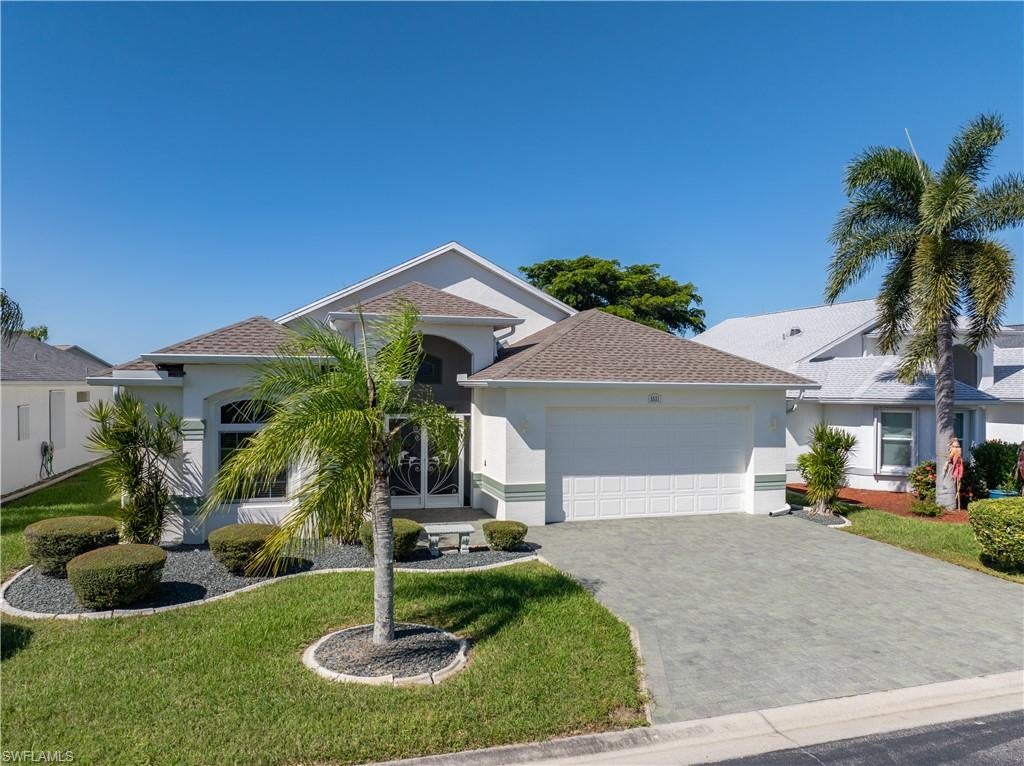 Impeccably clean and move-in ready, this popular Boca Grande model offers a wonderful blend of comfort, functionality, and the active Florida lifestyle. Located in Sabal Springs, an active 55+ community, residents can enjoy an impressive array of amenities, including golf, tennis, pickleball, a community pool, restaurant and bar, and a community center.

Inside, tile flooring extends throughout the home, with the exception of the guest bedroom. The kitchen features granite countertops, while the versatile third bedroom, with double doors, can serve as a guest bedroom, den, or home office. The guest bedroom also features a convenient Murphy bed, perfect for accommodating visiting family and friends. Extra storage throughout the home and garage adds everyday convenience.

One of the home's standout features is the impressive 12' x 44' extended screened lanai spanning the length of the home. This expansive outdoor living space offers plenty of room to relax, entertain, and enjoy the beautiful Southwest Florida weather year-round.

Major updates provide added peace of mind, including a NEW ROOF (February 2023), exterior paint (2023), new gutters (March 2023), nine impact windows installed in September 2025, and a NEW A/C (January 2021). Accordion shutters on the windows, front door, and rear sliding glass doors provide additional storm protection. Other features include a Lifestyle garage screen system installed in October 2020, overhead garage storage added in December 2020, and a washer and dryer with pedestals purchased in December 2023.

With its immaculate condition, valuable updates, flexible living space, and exceptional extended lanai, this inviting Boca Grande home is ready for you to move in and enjoy all that the Sabal Springs lifestyle has to offer!