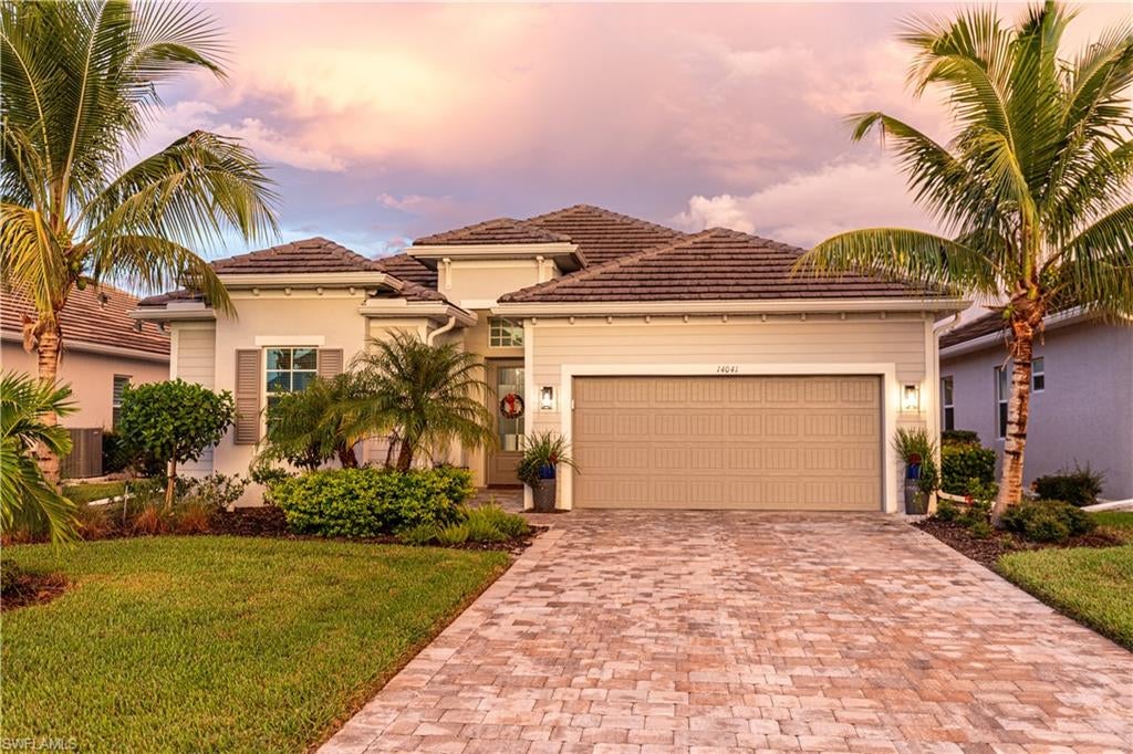 Welcome to your dream home in the exclusive community of WildBlue! This stunning single-family home boasts 4 bedrooms, 3 bathrooms, and a 2-car garage, providing ample space for your family to live and grow. The modern kitchen features stainless steel appliances, quartz countertops, and tile flooring throughout the house.  This home is perfect for entertaining guests or preparing family meals then Step outside to the extended lanai with an outdoor kitchen, ideal for enjoying the beautiful Florida weather year-round.  Retreat to the luxurious owner's suite, Large Walk in closets and complete with double sinks and a large shower, providing a spa-like experience right at home. One of the Guest room is an on-suite with its own private bathroom.   WildBlue offers a plethora of amenities for residents to enjoy, including a community pool, boating access to a large lake, a resort-style pool, lap pool, poolside dining, and a cafe bar. Stay active with tennis and pickleball courts, a gym, and exercise classes available for all residents. Whether you're looking to relax by the pool, enjoy water activities on the lake, or stay active with sports and fitness classes, WildBlue has something for everyone. Don't miss your chance to live in this Gated sought-after community and experience the ultimate Florida lifestyle!
