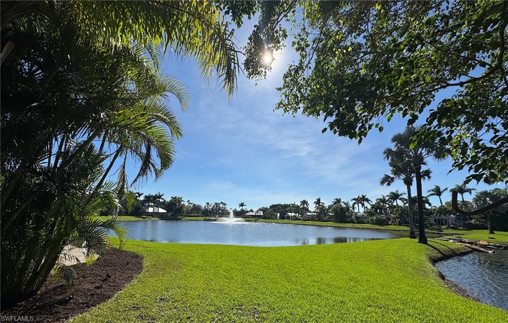 Lot 11 – A Shady Waterfront Paradise for Your Class A Motorcoach. Discover the essence of Florida living with this dreamy Class A Motorcoach lot nestled in the lush, welcoming community of RiverBend. Lot 11 offers the perfect combination of privacy, luxury, and natural beauty, with features that make every day feel like a getaway.
This enchanting property is shaded by a majestic banyan tree, providing a cool and comfortable retreat while adding to its serene charm. The extended patio leads to a grassy peninsula overlooking two tranquil lakes. The sparkling fountain offers a picturesque view, whether under the Florida sun or glowing in the moonlight.
The beautifully appointed coach house is both functional and stylish. Inside, you’ll find a kitchenette with a refrigerator, a stackable washer and dryer for convenience, and a neutral light-blue interior complemented by natural wood-look flooring. A modern bathroom features a pedestal sink and an etched-glass shower door, while creative storage and display areas make it easy to showcase your treasures. Outdoor living is a breeze, with a dining table and seating for six under the stars or a cozy firepit for gathering with friends. Whether you’re relaxing with a good book or entertaining guests, this property is designed to suit every mood. RiverBend Motorcoach Resort offers an unparalleled lifestyle. Cruise through this golf cart-friendly community along the scenic Caloosahatchee River, where pets are part of the family, and a private boat ramp awaits for spontaneous river adventures. The resort-style amenities include an expansive pool, year-round pickleball courts, and a cabana bar for relaxing in style. The River Clubhouse is a serene retreat with captivating river views, while the Pool Clubhouse offers a lap pool, hot tubs, and endless opportunities for relaxation. The community comes alive during the vibrant winter season with a full calendar of activities, from billiards and bingo to R/C clubs and model train watching under the shade of majestic oak trees. With bocce, shuffleboard, putting greens, and an exercise room, there’s truly something for everyone.
This exceptional lot combines the best of nature, community, and resort-style living, creating a one-of-a-kind retreat you’ll never want to leave. Make Lot 11 at RiverBend your Florida sanctuary today! Investment opportunity, please ask agent about rental dates for 2025 to 2026 season.