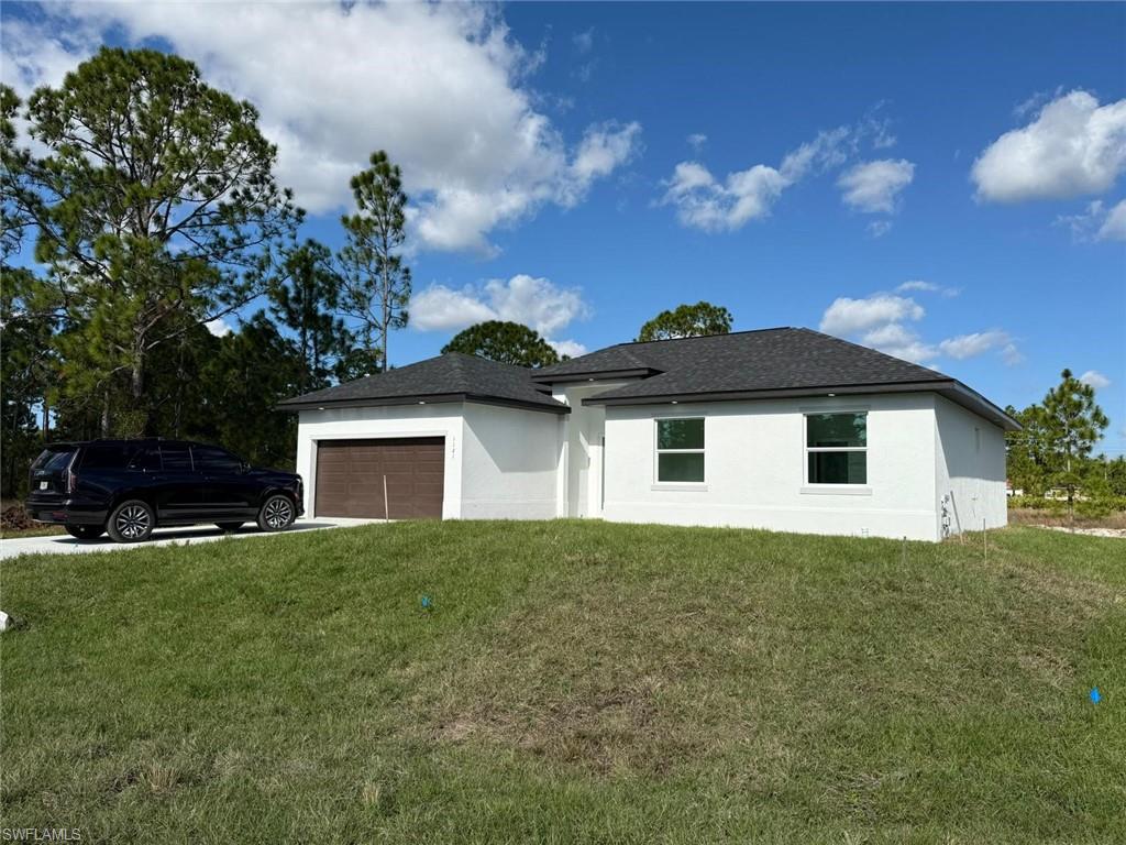 Brand new construction !! This beautiful single-family home located on a corner lot features 3 bedrooms plus a den that can be used as a fourth bedroom, home office or playroom, 2 full bathrooms, and a 2-car garage. Open floor plan with porcelain flooring throughout, modern kitchen with quartz countertops, stainless steel appliances, and custom cabinetry. Includes laundry room, central A/C, and impact windows. Covered patio and spacious backyard. Available for sale or rent.
This move-in ready home is ideal for families, professionals, or investors seeking quality new construction in Lehigh Acres, FL.