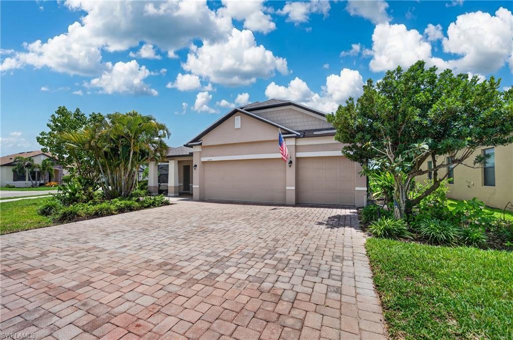 Welcome to this beautifully appointed home located in the desirable River Club community of Punta Gorda. Offering over 2,400 square feet of living space, this residence features an open-concept design enhanced with upscale finishes and a functional layout ideal for both everyday living and entertaining. Step inside to find a spacious great room with abundant natural light, complemented by elegant interior details and upgraded finishes throughout. The gourmet kitchen showcases solid wood cabinetry, solid surface countertops, and ample prep space, seamlessly flowing into the main living and dining areas. The primary suite offers a private retreat with a walk-in closet and a well-appointed en-suite bath designed for comfort and convenience. A split-bedroom floor plan provides added privacy, along with a versatile den perfect for a home office or flex space. Step outside to your private outdoor living area featuring a fully equipped outdoor kitchen—ideal for entertaining and enjoying Florida living year-round. Situated on a premium corner lot, the property provides additional space and a sense of privacy. Additional highlights include a 3-car garage, indoor laundry room, and access to River Club’s gated amenities, including a community pool and fitness center. Conveniently located near shopping, dining, and major roadways, this home blends comfort, style, and location.