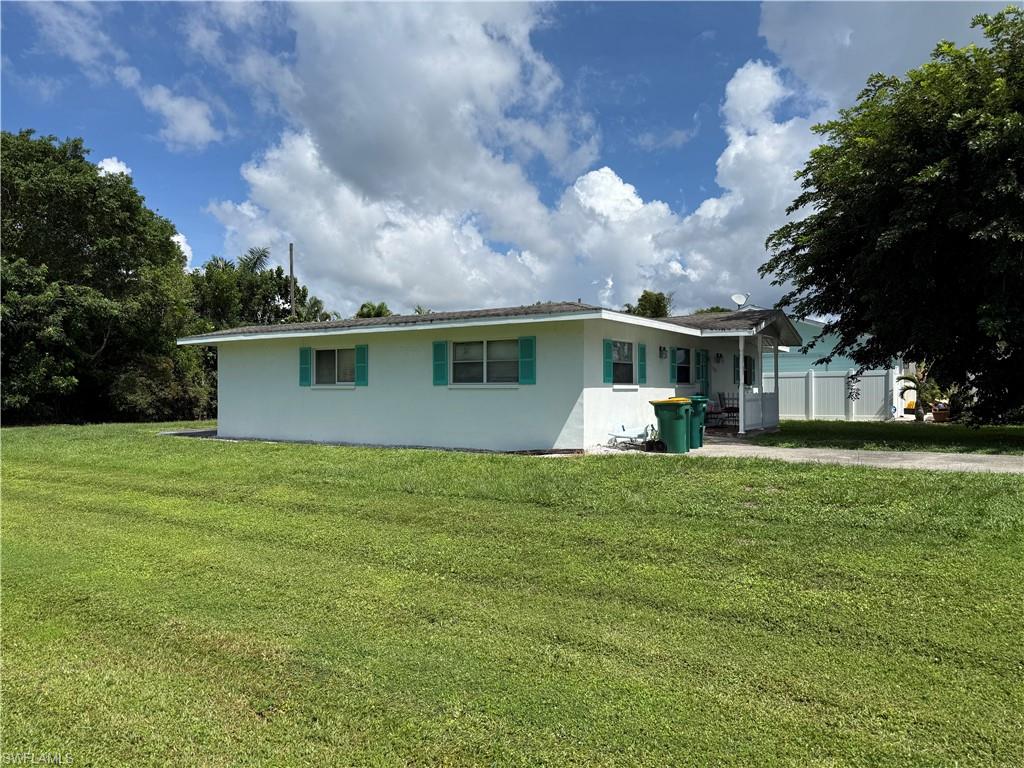 3-bedroom, 3-bathroom home featuring a split floor plan, spacious country-style kitchen, and corner lot. Conveniently located within biking distance of the beach. Property is in need of significant repairs and updates and is being sold AS IS. Great opportunity for buyers or investors looking for a renovation project.