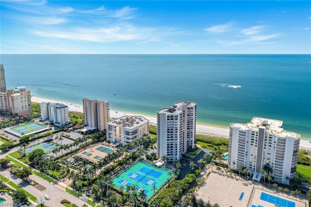 Experience exceptional Gulf-front living from this beautifully updated three-bedroom, two-and-a-half-bath residence ideally positioned directly on the sugar-sand beaches of Marco Island. Captivating beach and Gulf views are enjoyed from nearly every room, creating a stunning backdrop for relaxed coastal living.

The beautifully redesigned interior blends contemporary sophistication with an inviting coastal aesthetic. At the heart of the residence, the high-end kitchen features crisp white quartz countertops, modern cabinetry, premium finishes and an open design that takes full advantage of the spectacular views. Multiple open-air balconies provide the perfect setting to enjoy Gulf breezes, colorful sunsets and panoramic vistas of the beach and water.

The spacious bedrooms offer comfortable private retreats, while the beautifully renovated baths showcase contemporary coastal finishes and thoughtful attention to detail throughout.

Residents enjoy an impressive collection of resort-style amenities, including a beachfront pool and spa, social room, fitness center, sauna, barbecue and outdoor dining areas, pickleball and tennis courts, and direct access to Marco Island’s renowned beach.  A short stoll to shops and restaurants for your enjoyment.   

Beautifully updated and surrounded by breathtaking Gulf views, this exceptional residence offers the perfect combination of sophisticated interiors, resort-style amenities and an extraordinary toes-in-the-sand Marco Island lifestyle.