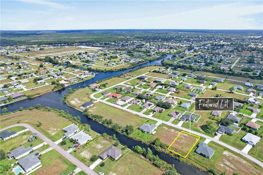 Build Your Florida Dream in Cape Coral!
Discover the potential of this vacant residential lot , nestled in a quiet setting surrounded by established homes and Florida’s natural beauty. Enjoy the peaceful atmosphere and the added appeal of a freshwater canal along the property, offering a scenic backdrop for your future home.
Whether you’re planning to build your dream home, create a personal Florida retreat, or invest in land for the future, this property offers an exciting opportunity to bring your vision to life.
Enjoy the space, privacy, and relaxed lifestyle that make Cape Coral such a desirable place to call home. Secure your piece of Southwest Florida and explore the possibilities!