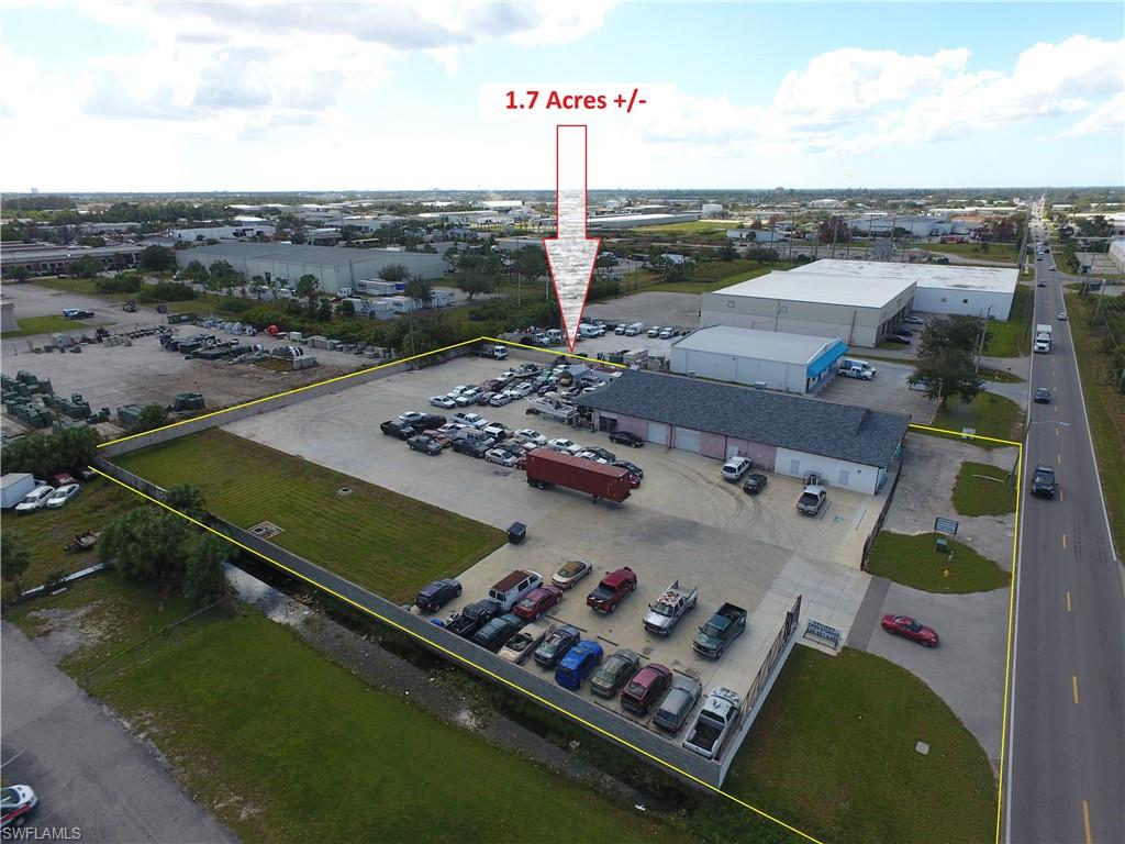 This 7,056 square foot building was built in 1982, made of CBS construction, and originally built as a duplex. The front portion of the building consisting of a firearms and security guard training center, retail shop, shooting range, 2 private offices, staging area and 3 restrooms. The rear section is an automotive repair business 20'X60' and mostly warehouse space with one overhead door and service bay with 1 restroom. Building is currently divided into 4 units, although the walls could be removed to create one open space for a single tenant or end user. With 1.7 acres of land, a concrete parking lot, fenced yard, CBS building, Hanson Street frontage, access to Metro, Fowler and US 41 to the west and minutes from Interstate 75 to the east, makes this conveniently located and unique property a perfect fit especially if the buyer conducts business within the tri-county area. A great contender for many industrial and retail type uses and located within the City limits of Fort Myers.