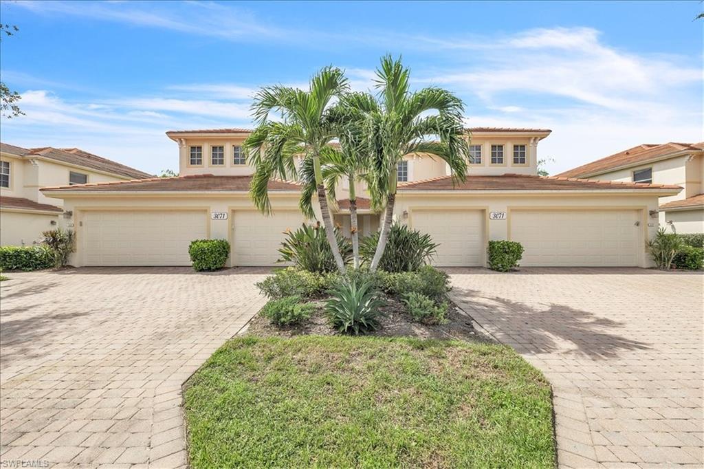 A first-floor coach home with a 2-car garage and a spectacular view of the Golf Course is now available at an attractive price. This property offers over 1400 sq. ft. of living space, featuring 2 large bedrooms and a den with 2 baths. The home has been updated with quartz countertops in the kitchen and bathrooms, a custom pantry with a sliding glass door, diagonal tile throughout the main areas, newer appliances (replaced within the last 5 years), crown molding in the main areas, new carpets in the bedrooms, custom shelving in the primary closet, a frameless glass shower in the primary bathroom, and upgraded light fixtures and fans. The lanai, which has a tiled floor, offers one of the best views of the recently renovated Old Orange Golf Course on hole #5. It also features a large picture window screen and a retractable sun screen for added comfort. The garage is equipped with double overhead storage racks in the spacious 2-car garage. Idlewild had new roofs replaced in 2021 and fresh exterior paint in 2023. Residents of Idlewild have access to their own community pool, fitness center, and club room just a block away. As a member of the Verandah Club, residents also have access to 2 Championship Golf courses during certain times of the year, unless they are full golf members. Other amenities available in the Verandah gated community include tennis, pickleball, a state-of-the-art fitness center, bocce, kayaks, a dog park, a playground, multiple restaurants, and a very active social calendar year-round to meet everyone's interests. The seller would entertain a short-term 3-5 year financing option at a reduced interest rate from the market. Don't miss out on this opportunity to own your place in Paradise, as this unit will not last long.