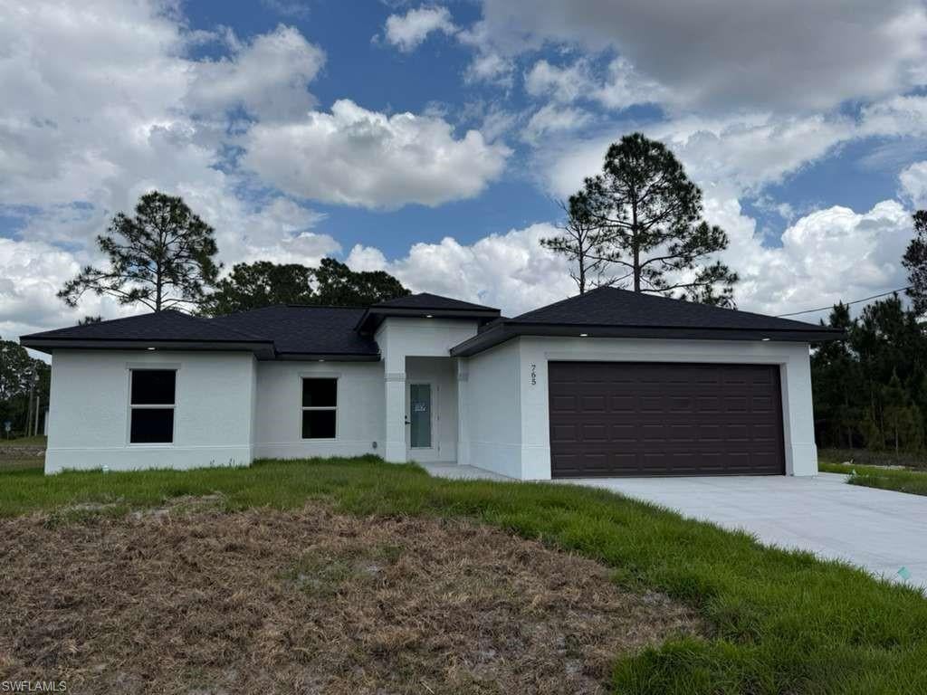 Brand New Construction in Lehigh Acres!

Beautiful newly built home featuring 3 bedrooms, 2 full bathrooms, and a 2-car garage. This modern property offers porcelain tile flooring throughout, impact windows and doors, high ceilings, stainless steel appliances, quartz countertops, and a spacious open-concept layout perfect for everyday living and entertaining.

Enjoy a dedicated laundry room, epoxy garage floor, and a covered lanai overlooking the canal for added privacy and relaxation.

Great opportunity for homeowners or investors in a fast-growing area of Lehigh Acres.

The adjacent lot may also be available for purchase separately and can be negotiated independently from the home sale.