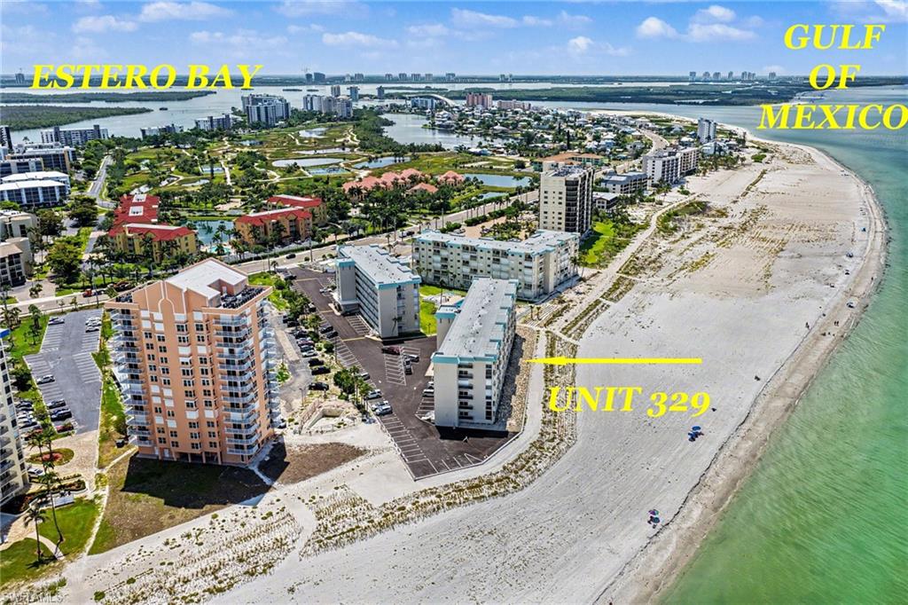Wake up to breathtaking, unobstructed Gulf views from this beautifully appointed direct Gulf-front 2-bedroom, 2-bath condo. Offering the perfect blend of comfort, style, and coastal charm, this residence features tasteful furnishings with a relaxed beach-inspired vibe, making it move-in ready for your own island retreat.  Crown molding extends throughout the unit, while impact-resistant windows and sliding glass doors provide peace of mind and are nicely complemented by classic plantation shutters. The spacious Gulf-front lanai is designed for year-round enjoyment with new electric shutters.  Roll the shutters up and enjoy the lanai wide open.  There is also a screen door.  You can also lower the picture-window no-seeum screen, allowing you to savor spectacular sunsets and soothing sea breezes.  Both bedrooms offer en-suite baths, walk-in closets, and exceptional privacy. The guest bedroom impact-resistant window is new, and the water heater was replaced just one year ago. For added convenience, an in-unit washer and dryer may be installed, although the community laundry facilities are located nearby.  There's also a small storage locker just down the hall from the unit.  Step outside and the sugar-white sands of the Gulf are literally at your doorstep. When you're ready for a change of scenery, enjoy the community pool or join in the vibrant social atmosphere at Leonardo Arms, where residents gather for pool parties, dinners, and a variety of community events.  Your monthly condominium fee includes DIRECTV and internet service. Boaters will appreciate having Loggerhead Fish Tale Marina directly across the street, offering boat sales, rentals, service and storage. Located at the desirable south end of the island, Leonardo Arms is also within easy walking distance of restaurants and shopping, while providing convenient access to Bonita Springs, Naples, and Southwest Florida International Airport.  Whether you're searching for a full-time residence, seasonal getaway, or investment opportunity, this exceptional beachfront condo offers the lifestyle you've been dreaming of. After all, the most important feature is one that can never be duplicated—you are living directly on the beach.