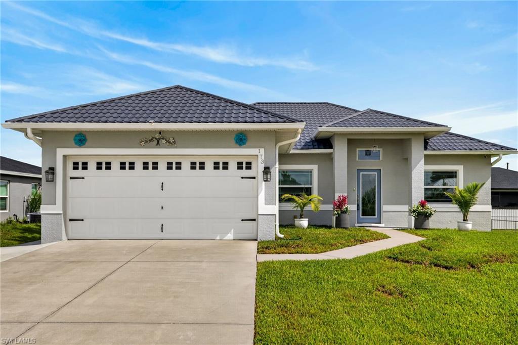 The home you've been looking for is finally here. Over $80,000 in quality upgrades make this move-in ready home an exceptional value! Situated on a rare 1/2 acre double lot, this beautifully updated 3 bedroom, 2 bath home offers the space, privacy, and flexibility today's buyers are looking for, including enough room to build a second home, guest house, or create your own backyard oasis. From the moment you arrive, you'll appreciate the extended driveway, attractive curb appeal, and meticulous care that has gone into every improvement.

Inside, the remodeled kitchen features quartzite countertops, newer stainless steel appliances, and modern finishes, while both bathrooms have also been tastefully updated. Major improvements provide peace of mind for years to come, including a metal roof (2023), impact-resistant windows, tankless water heater, reverse osmosis system, and a home that's already set up for a whole house generator. Step outside to the extended lanai. It's the perfect place to relax, entertain, or enjoy Florida's beautiful weather year-round. With all these big-ticket upgrades already completed, this home is truly move-in ready.

Whether you're looking for your forever home, room to expand, or an investment with future potential, opportunities like this don't come along often. 

Conveniently located with easy access to shopping, dining, schools and major roadways.