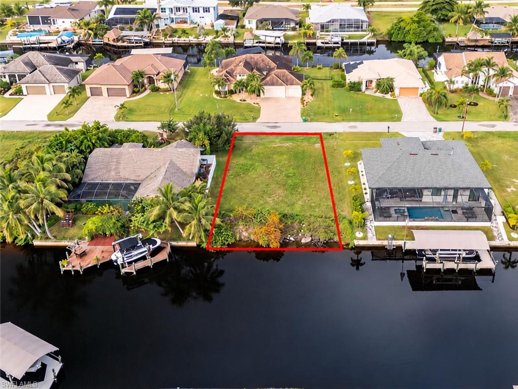 Build your dream waterfront home at 1019 NW 39th Ave in desirable NW Cape Coral! This Gulf-access lot offers a less than 30-minute boat ride to open water through Matlacha Pass. Enjoy nearby Crystal Lake Park, featuring a beach, walking trails, kayaking, and outdoor recreation. Adding to the area's appeal is the proposed Seven Islands waterfront development, envisioned to bring dining, entertainment, a marina, and additional amenities to Northwest Cape Coral. With exciting projects and continued development planned for the area, now is your opportunity to secure a waterfront property in a growing community.