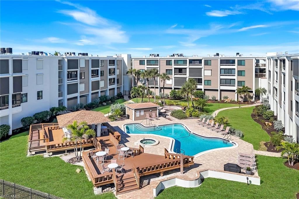 Motivated Seller!! Indulge in panoramic, unobstructed Gulf views from this elegant top-floor residence in the prestigious Nutmeg Village community. This impeccably remodeled 2-bedroom, 2-bath coastal retreat blends refined design with effortless comfort. Reimagined in 2017 by Cornerstone Builders, the gourmet kitchen boasts quartz countertops, a designer tile backsplash, soft-close custom cabinetry, abundant storage, and premium stainless-steel appliances. Expansive south-facing Gulf vistas become the backdrop of everyday living, enhanced by the thoughtfully enclosed lanai that extends the main living area and maximizes natural light. The serene primary suite offers sweeping water views and features upgraded closets along with a beautifully appointed en-suite bath. With no storm damage and meticulous upkeep, this residence is truly move-in ready. Photos show staged furnishings which are no longer in the unit.