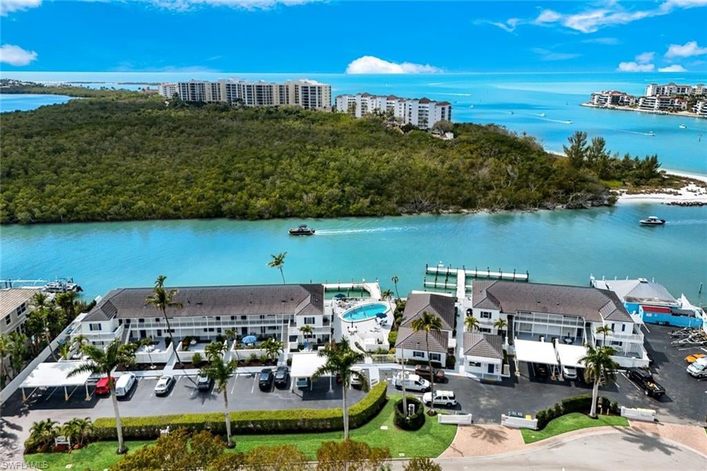 Phenomenal water views and endless potential await in this rarely available one-bedroom, one-bath residence at Florida Pavilion Club, an intimate waterfront community in the heart of Olde Marco. There are 7 docks and the fee is $2.00 per foot per day, $7.50 per foot per week and $15.00 per foot, per month.  This unit is a true renovation opportunity, offering the chance to completely reimagine the interior and create a coastal retreat perfectly suited to your style and vision, and in an enviable waterfront setting. Florida Pavilion Club offers a relaxed boating lifestyle, with docks available for lease that provide access to the waterways and the Gulf beyond, with no bridges. Residents also enjoy a waterfront community pool and the laid-back atmosphere of this charming, low-density community. Located in Olde Marco, this property puts you close to some of Marco Island's favorite waterfront restaurants, shops, marinas and local attractions, while still offering a peaceful retreat away from the busier areas of the island. Whether you're looking for a seasonal getaway, investment opportunity, or a residence you can transform from the ground up, A3 offers a rare combination of spectacular views, boating access, and an exceptional Marco Island location. Bring your vision and create something truly special in Florida Pavilion Club.