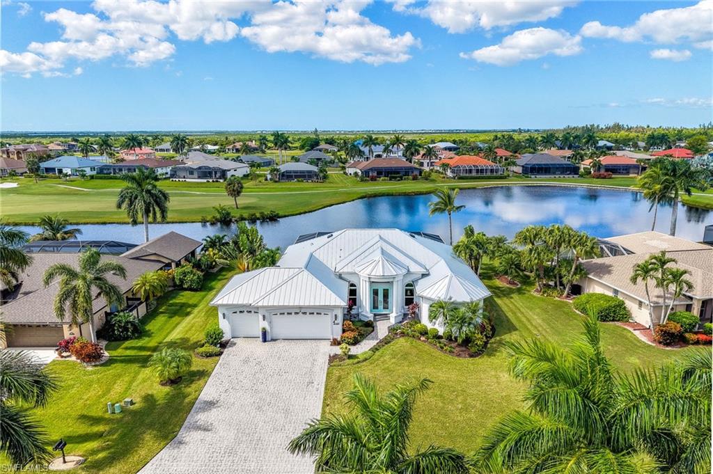 PRISTINE LUXURY | LAKE & GOLF COURSE VIEWS | EXTENSIVE UPGRADES

A DISTINCTIVE CAPE ROYAL OPPORTUNITY! Offered at Exceptional Value $779,700, 11959 Prince Charles Court combines panoramic sunset views over the beautiful lake and golf course, a generous .285-acre homesite, a heated pool, and substantial recent improvements. This meticulously maintained 3-bedroom, 2-bath residence offers 2,251 square feet of living space, 3rd bedroom currently used as office/den easy to transfer for guests with Murphy bed included with access to pool.  Standing-seam metal roof, impact-rated protection, and an oversized 3-car garage. With significant updates from 2023 through 2026, this home blends refined comfort, peace of mind, and exceptional Florida outdoor living.

Inside, 10-12-foot Tray ceilings, a dramatic 14-foot volume ceiling in the great room, and elegant 8-foot interior doors create an open, upscale atmosphere. Commercial-grade luxury vinyl plank flooring compliments the inviting living spaces.

The renovated kitchen features extended cabinetry and expansive granite countertops, including a generous center workspace ideal for cooking, baking, and entertaining.

The primary suite offers an OPULENCE spa-inspired retreat with oversized 24" x 48" porcelain tile, a 6-foot freestanding square soaking tub, and a separate freestanding tub filler. Impact-rated windows, additional PGT window replacements in 2023, and double-entry impact front doors provide added protection.

Major improvements include a standing-seam metal roof and new gutters installed in 2023, plus three solar attic ventilation fans. The HVAC system was updated in 2026 and features infrared technology.

Enjoy the newly refurbished heated pool with fountain, completed in 2026, and the impressive 60' x 40' screened pool enclosure  with remote LED multi-color lighting installed in 2023. The scenic lake and golf course views provide an inviting backdrop for relaxing and entertaining.

The oversized 3-car garage offers more than 700 square feet, an epoxy-coated floor, insulated ceiling, and insulated garage doors. An irrigation well with automatic sprinklers and timer helps maintain the landscaping.

Discover the distinctive setting, extensive improvements, elegant interior features, and inviting outdoor living that make this Cape Royal residence stand out. View the property video and schedule your private showing today!  Cape Royal Includes: Pro shop, Restaurant, 27-Holes of Golf,  Bocce courts, Tennis and pickleball. Located in non-incorporated Lee County Means LOWER TAXES. 

"Move-In Ready Option: majority of furnishings and select turnkey items available/negotiable separately."

 Seller is Licensed Realtor.