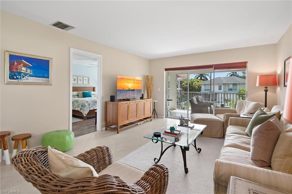 Experience the ultimate Naples lifestyle from this beautifully positioned two-bedroom, two-bath waterfront condominium offering deep-water direct Gulf access and your own private boat dock with lift, perfect for boating enthusiasts eager to explore Naples Bay, the Gulf and the area's pristine waterways. On the second floor, this light-filled residence enjoys an elevated setting with tranquil canal and marina views from the spacious screened lanai, creating the ideal place to relax with your morning coffee or unwind after a day on the water. A rare and desirable feature, the property also includes a dedicated detached garage, providing secure parking and additional storage. Ideally located just moments from the heart of downtown Naples, you'll enjoy easy access to the world-renowned dining, boutique shopping and vibrant galleries along Fifth Avenue South, as well as the sugar-white sands and breathtaking sunsets of Naples Beach. Whether you're searching for a seasonal retreat, a year-round residence, or an exceptional waterfront investment, this property offers the perfect combination of location, boating lifestyle and best of coastal Naples living.