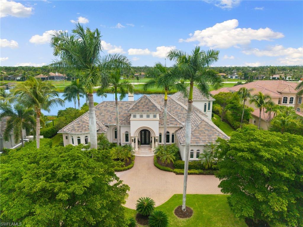 Incomparable is the word! Experience peerless luxury at 2145 Canna Way in Grey Oaks. Offering 6,074 sq. ft. of air-conditioned living space (8,102 sq. ft. total), this meticulously reimagined estate combines soaring ceilings, and abundant natural light. Panoramic views of sunrises, water and fairways shall embrace you everyday!  Designed for effortless entertaining, the epicurean kitchen features dual leathered quartz islands, top-tier Wolf/Miele appliances, built-in coffee system, and custom hidden walk-in pantry. The adjacent open living area flows into a bespoke wet bar accented with custom art-glass panels, wine storage, and ice maker.

The lavish primary suite is a private retreat complete with dual walk-in closets, two water closets, a smart heated bidet, and a heated towel rack. Three additional en-suite guest bedrooms, an oversized paneled study, and a versatile second-floor loft provide ample space for family and visitors. Outdoors, the covered lanai boasts a fireplace, summer kitchen, television, pool, and motorized screens - an idyllic setting for year-round relaxation. Extensive 2019 renovations include: Custom interior design, new roof, new front facade, HVAC, wiring, plumbing, and Control4 automation to name a few.  A lift-ready three-car garage offers extra security and storage.  This exceptional property also grants exclusive access to Grey Oaks' premier amenities, including three championship par 72 golf courses, four restaurants, reciprocal dining at Prime Social, two clubhouses, and a 30,000-square-foot Wellness Center. Generous provisional golf also available- inquire with agents.