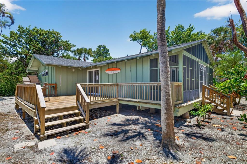 Only three houses from the incredible beach of Captiva, this quaint cottage sits near the end of a private shell drive. This is beach living at its easiest. The open living area is ready to be transformed into a fabulous living space with high ceilings adjacent to the existing screened front porch and an open deck accessible from the kitchen and living area. Two en suite bedrooms finish the space, one of which includes access to a private screened porch. Currently down to studs, this home is ready for a new owner to create a fabulous beach house in this amazing location. The shops and restaurants of the Captiva Village are within short walking distance. The home next door at 11550 Laika Lane is available for purchase as well. With two contiguous properties in this Captiva Beach location, there is unbelievable potential!