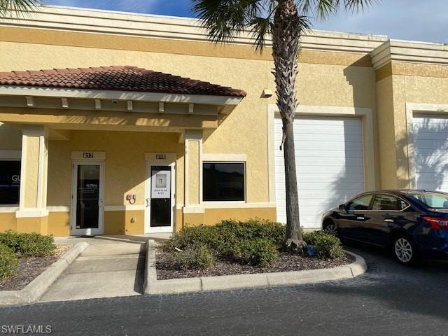 Concrete block, light and bright office/showroom, 16' ceilings in warehouse with 14' overhead door.  Great for small business, car collector, storage, distribution.