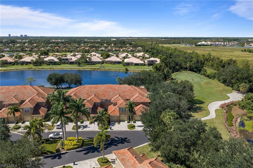 BREATHTAKING GOLF COURSE AND LAKE VIEWS! Welcome to this spacious 4-bedroom, 3-bath second-floor condo located in the highly desirable Grandezza community in Estero! Offering 1,967 square feet of living space, this beautifully designed residence features soaring vaulted ceilings, plantation shutters throughout, tile flooring in the main living areas, and plush carpeting in the bedrooms. The open-concept floor plan is perfect for entertaining, with a spacious kitchen overlooking the great room. The generous primary suite features a large walk-in closet and an attached bath with dual sinks, and a large walk-in shower. Step outside to your screened rear lanai and enjoy spectacular views of the sparkling lake and lush golf course—the perfect setting for morning coffee or evening relaxation. Additional highlights include an attached 1-car garage. Grandezza offers an exceptional country club lifestyle with a magnificent 53,000-square-foot clubhouse featuring indoor and outdoor dining, a resort-style swimming pool and spa, fitness centers, six Har-Tru tennis courts, bocce ball, basketball, and a vibrant calendar of social activities. Golf enthusiasts will appreciate the beautifully maintained 18-hole championship golf course designed by Darwin Sharp III, with golf memberships available separately. This prestigious gated community is surrounded by lush tropical landscaping, sparkling lakes, and beautifully manicured grounds. Ideally located just minutes from Miromar Outlets, Coconut Point Mall, Gulf Coast Town Center, Hertz Arena, FGCU, RSW International Airport, and Southwest Florida's stunning Gulf beaches. Experience resort-style living at its finest in one of Estero's premier golf course communities!