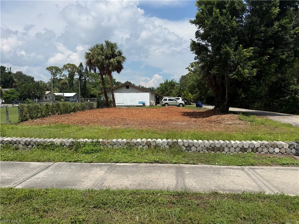 Excellent opportunity to secure a cleared commercial lot offering great visibility and convenient access just off a main roadway. The property features valuable road frontage and an existing sidewalk, providing excellent exposure and accessibility for a variety of potential commercial uses. With the site already cleared, you can save time and expense when planning your future development. Ideally positioned near an established travel corridor, this property offers strong potential for a business, office, retail, storage or investment opportunity. Bring your vision and take advantage of this well-located commercial parcel!