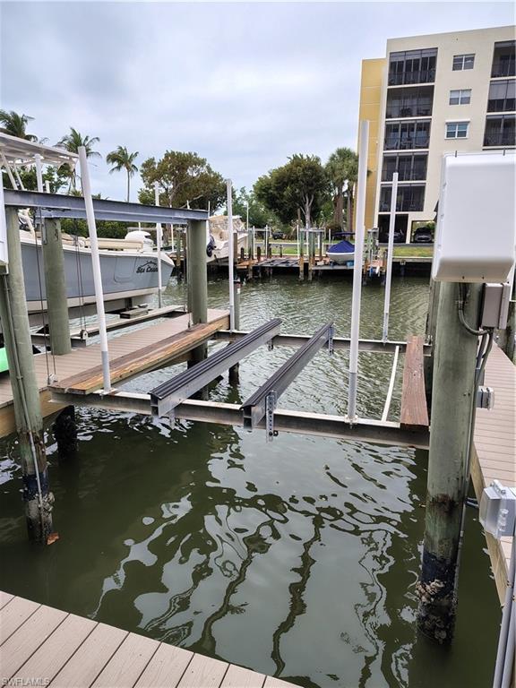 Dock #7 with 10,000 lb. lift at Casa Marina is ready for your boat!!  This dock has new weather-resistant motors, belts, rubber-covered adjustable bunks & guide poles w/updated maintenance all completed by Stokes Marine. New auto GEM remote box with programmable presets to raise & lower your dock on command to the preset levels.  All new electrical feeds & main panel breakers, plus a separate dock shut-off for the GEM box.  Also, a dedicated GFI outlet at the boat for battery charger.  $800 annual dues.  Assessments for the new dock fingers and a new dock walkway have also been paid in full by the Seller.  Stokes Marine has completed the install of new dock fingers & walkways.  Nice fill-in area in the front makes it easy to board and access the boat from all sides.  The new Buyer must be an owner in the Bay Beach development.