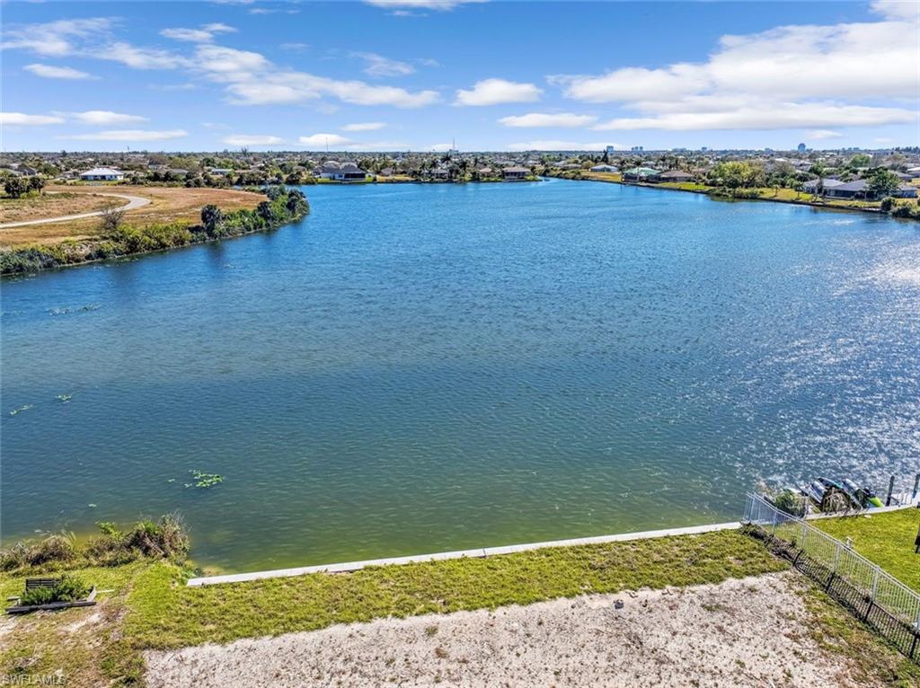 Stunning and rare Lake Lot including new Seawall, Citywater is in and all assessments are paid. Amazing piece of paradise with a breathtaking view overlooking Lake Meade. Completely cleared and ready to be built on. Wake up and enjoy beautiful sunrises, go boating, fishing, kayaking or just bird watching, all from your very own backyard. Be on Del Prado, Pine Island corridor, US-41, Punta Gorda and beaches in just minutes, short distance to Fort Myers International and Punta Gorda Airports. Close to shopping, schools, medical facilities, golf courses and dining. Builder package available if needed, flood Zone X so no flood insurance required.
