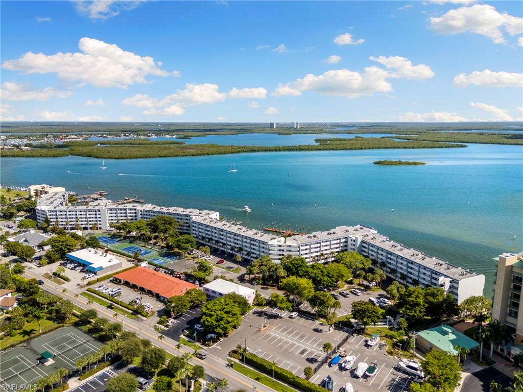 Resort living at its finest! Upgraded Riverside condo. Experience the ultimate Marco Island lifestyle in this beautifully remodeled, turnkey condo located within the highly coveted, gated Riverside Club. Combining worry-free maintenance, modern interior upgrades and front-row seats to Florida's finest waterfront entertainment, this property is the perfect tropical retreat or investment. Move in Ready: Turnkey furnished, updated kitchen, sleek walk-in shower. Storm-Ready: newer impact doors and windows. Boaters Paradise: Direct gulf access. On-site boat slips available for lease at an incredible 600 per year, complete with secure, locked boat storage yard. Active Lifestyle: Fish directly from the community docks or jump into a game on the pickleball and tennis courts. Relaxation: Take advantage of 2 heated pools, 2 soothing spas, and social gatherings at the property's own Pelican Pier. Location: leave your car keys behind. This condo is just steps from boat and bike rentals, diverse shipping and the world-famous Snook Inn. Views: Marco River, Swimming pool, dolphins, birds and more! Rentals in place for 2027 season. If you close now, you will have immediate rental income!