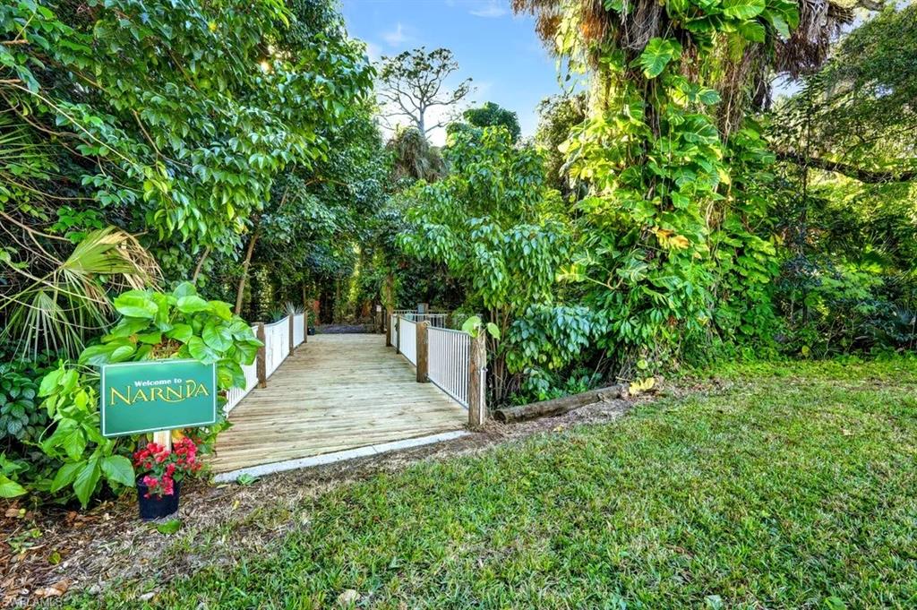 MAI Appraisal in hand - $1,130,000 - welcome to your own private oasis nestled in the heart of Southwest Florida. Located just a block east of the Cape Coral City limits and south of Pine Island Road (SR 78), this unique 5.17-acre property in North Fort Myers offers exceptional privacy, versatility, and convenience. The land consists of three connected parcels—14611 Smokey Hollow Lane, 14630 Smokey Hollow Lane, and 1345 Barrett Road—providing a rare opportunity for residential, agricultural, and storage uses. A secluded private drive nearly 900 feet long leads you to the main homesite, surrounded by nature and mature Florida landscape. The property features a small pond, an active creek, and a charming wooden bridge connecting to the westernmost section of the land, where some of the area’s largest cypress trees can be found. Parcel Details & Improvements, 1345 Barrett Road (2.25 acres, AG-2 zoning) • Excellent road-frontage potential • Formerly operated as a plant nursery • On-site well with standing sprinkler irrigation • Includes an outbuilding currently used for storage (not livable in current condition). 14630 Smokey Hollow Lane (~2,000 sq. ft. home) • 2-story residence built in 1991, • 3 bedrooms / 2 1/2 bathrooms, • New roof and fresh interior and exterior paint, • New air conditioner ready for installation, • Newer appliances except dishwasher, • Well water with Kinetic filtration system. 14611 Smokey Hollow Lane, • Large metal barn for tool and equipment storage, • Additional pole barn, • Wooden bridge over Hancock Creek providing access to the west side of the property, This property is a rare find—over 5 acres of agricultural-zoned land with multiple structures, modern updates, unparalleled privacy, and an ideal location. Despite its peaceful setting, it is only minutes from grocery stores, hardware stores, shopping centers, dining, banking, commercial and flex-space developments, and more. Whether you’re seeking a private homestead, an agricultural venture, a multi-use property, or future potential, the possibilities are endless.