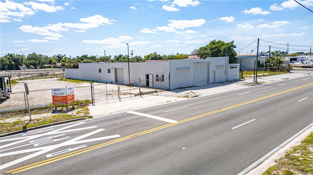 ±5,415 SF industrial building with strong functionality and multiple access points along Fowler Street. The property features three access points on Fowler, allowing for excellent circulation and visibility.
The building offers 12’ ceilings, steel bar-joist roof construction, and forklift capability, making it suitable for a variety of light industrial, contractor, or service uses. Interior improvements include two bathrooms and a 20’ x 12.5’ side room that can be used for office, storage, or workspace.
The property includes two roll-up doors—one facing Fowler Street and a larger door on the Alicia side—providing flexible loading options. Each side yard has its own gated access and garage door, allowing for secure outdoor storage or equipment access.
At the rear of the building is an enclosed concrete courtyard (approximately 48’ x 31’) that provides additional secure outdoor workspace or storage.
Additional features include alarm system capability.
Ideal for owner-users, contractors, or service businesses seeking a functional industrial building with strong access along the Fowler Street corridor.