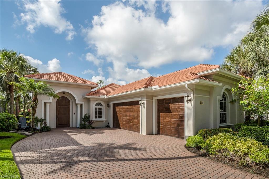 One of the best views in Olde Cypress with Southern Exposure.  Overlooking the 4th fairway and two ponds beyond.  Enter thru a beautifully landscaped private courtyard and into a most inviting space.  The open floor plan features coffered 12' ceilings with beautiful finishes and molding thruout adding to gradeur feel of the home.  Both Dining and living area expand out through pocketing doors onto a wonderful lanai with pool and spa.  The outdoor kitchen and spacious sitting area offer a great place to relax, dine and enjoy the lush picturesque landscaping.  Other great features include a Great Room fireplace with stacked stone wall, Master Bath with corner tub, oversized tile shower, surround sound speakers, Gas and propane service for pool and outdoor kitchen, roof replaced in 2019, wonderful granite kitchen with eating bar.  Two additional guest rooms and a second full bath and laundry complete the layout.  As a bonus there is another air conditioned flex room which is currently used as an office but flexible for many uses.  A THREE car garage for two cars plus a golf cart.  The Club at Olde Cypress is currently under total renovation that will make it the most premier club in the area.  The renovation is expected to be completed by February. Optional Golf memberships are currently available but not required. Club features include a vibrant social calendar, formal and informal dining options with NO minimums.  Tennis, Lap pool, Pickleball, Bocce, Tennis and fitness center are offered as well.  Comes be Wowed by this special offering.
