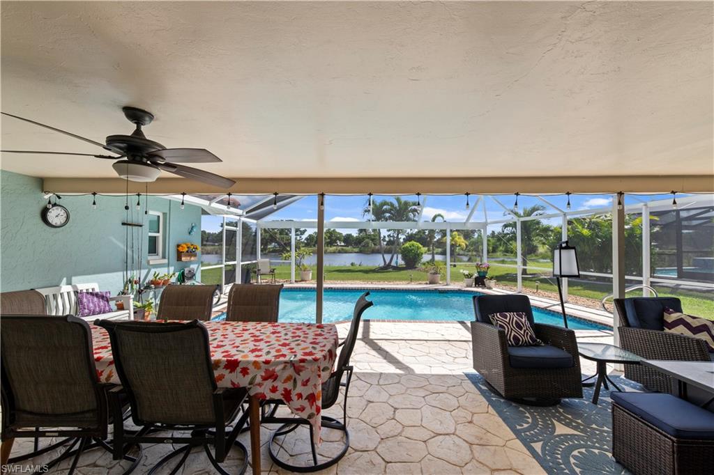 Imagine sitting by your screened pool, sipping a lovely beverage, gazing at the glorious sunrise over Garden Lake in your new home. But wait, you’re in the middle of Cape Coral only 2.5 miles away from the downtown area/Farmers Market? This home has it all, location & updates galore! Miami Dade rated anywhere that matters, doors and all. Tile throughout whole home. The island in the chef’s kitchen adjoining the dining and living area makes it the perfect place for gatherings. The very large outside living area is the big plus for entertaining or relaxing. With 3 sets of sliding doors leading out from both the living, primary bedroom and dining rooms and another walk out door from the guest bathroom makes mixing a breeze. The property features a convenient garage half bath, perfect for outdoor projects or workshop use. Extremely versatile floor plan will fit family with kids or professionals looking for enough space for two to have their own offices. Top it off with either totally upgraded or meticulously maintained in the years these caring owners have been here.