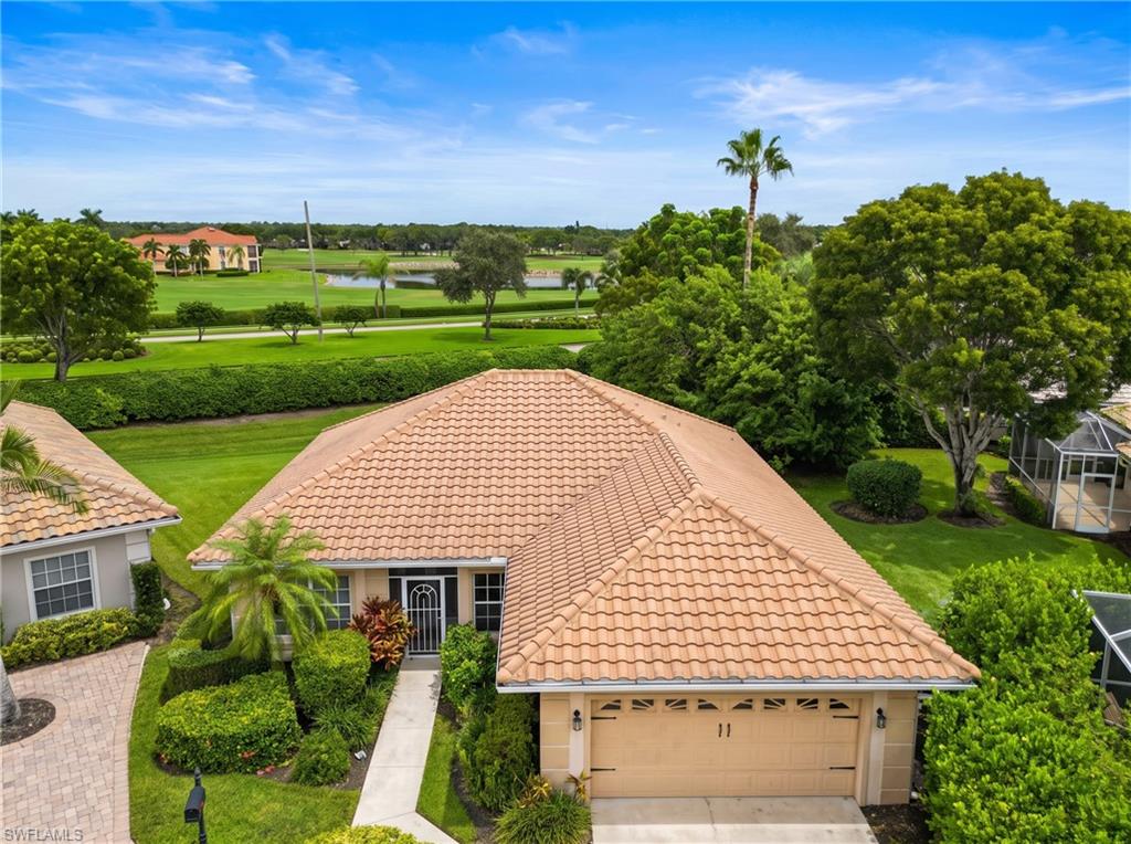 One or more photo(s) has been virtually staged, AI generated or rendered.  Enjoy an active, connected lifestyle in a naturally exquisite setting and championship golf courses! Experience refined Naples living in this beautifully updated home ideally positioned in the sought-after Falcons Glen Villas at Lely Resort. Offering stunning golf course and greenery views, this home provides a rare combination of modern designer finishes, comfortable living spaces, and premier resort-style amenities. The elevated design finishes with bright, open-concept kitchen with modern gray cabinetry and quartz countertops. Custom designer bathrooms featuring exquisite blue onyx-style tile and gold accents. Modernized vanities with illuminated LED mirrors.