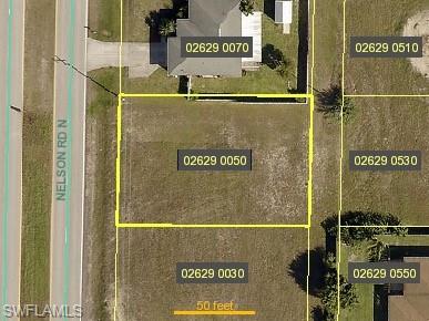 Build your new home on this single-family lot in NW Cape Coral! Approximately .24 acres with eastern rear exposure for morning sunshine and no HOA fees. Located outside the flood zone, with convenient access to Tropicana Parkway and the Pine Island Road corridor for shopping and dining. Nearby schools, parks, and the Northwest Regional Library add to the location’s appeal. A great opportunity for your future home or investment.