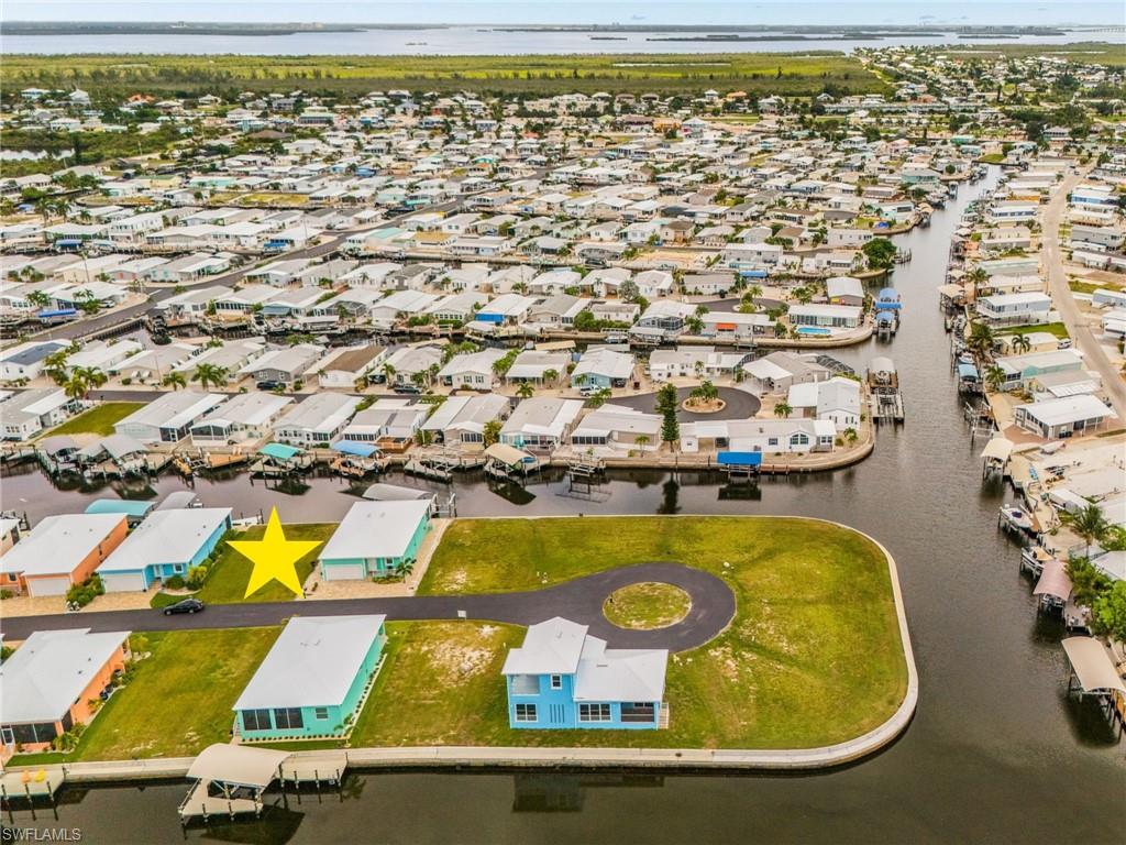 Discover Treasure Cove, Pine Island’s newest waterfront community, with fast, deep-water access to San Carlos Bay and the Gulf of Mexico. Designed with boaters in mind, Treasure Cove offers an exceptional location for fishing, cruising, and enjoying the Southwest Florida waterfront lifestyle. YOU MUST CHECK OUT THE VIDEO FLYOVER IN THE VIRTUAL TOUR. The community features low HOA fees, central water and sewer, and new homes built to today’s elevation standards to help reduce flood risk. Choose a complete home-and-lot package or purchase your waterfront homesite separately and build when you’re ready—there is no required timeline to begin construction. All home plans are subject to HOA approval. Secure your place in this new Pine Island waterfront community and start planning the home—and boating lifestyle—you’ve been waiting for.