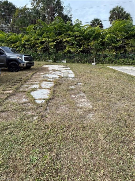 Desirable corner lot in Mariners Cove! Features an existing concrete pad, making it ready for your new home. Conveniently located just steps from the community pool and river, offering the perfect blend of comfort and coastal living