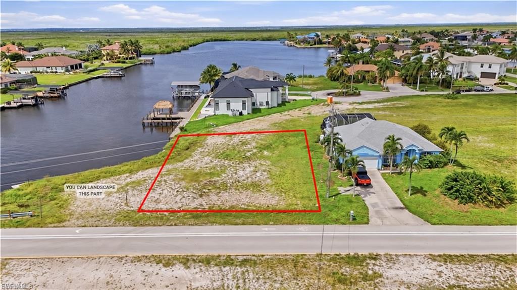 BUILD YOUR WATERFRONT DREAM HOME in one of NW Cape Coral’s fastest-growing areas. ONE OF THE HIGHEST LOTS in NW Cape and NO FLOOD INSURANCE needed. This Gulf-access homesite offers a premium setting near the Spreader Waterway with a NEWER 10-FT SEAWALL already installed, saving a future owner significant time, expense, and permitting work. Enjoy a wide-water setting with excellent boating access and no bridge restriction between the property and the Spreader Waterway.

The location gives you flexibility when designing your home, with water views and the potential to take advantage of both southern and western exposure. New luxury homes are being built nearby, adding to the appeal of this growing waterfront neighborhood.

The seawall installation included planning for a future dock location, giving the next owner a valuable head start when creating the complete Southwest Florida boating lifestyle. Buyer should verify current dock permitting requirements and specifications with the appropriate agencies.

Located along the growing Old Burnt Store Road corridor, the property is close to major new and planned investment in NW Cape Coral, including the Seven Islands/Gulf Gateway waterfront development, Tropicana Park, and continued commercial and residential growth throughout the Pine Island Road and Burnt Store Road area.

Whether you are planning a full-time residence, seasonal retreat, or custom luxury waterfront home, this property offers something increasingly hard to find: A BUILD-READY WATERFRONT SETTING with major infrastructure already completed and Gulf access just beyond your backyard.

Bring your builder, your boat, and your vision for Southwest Florida living.