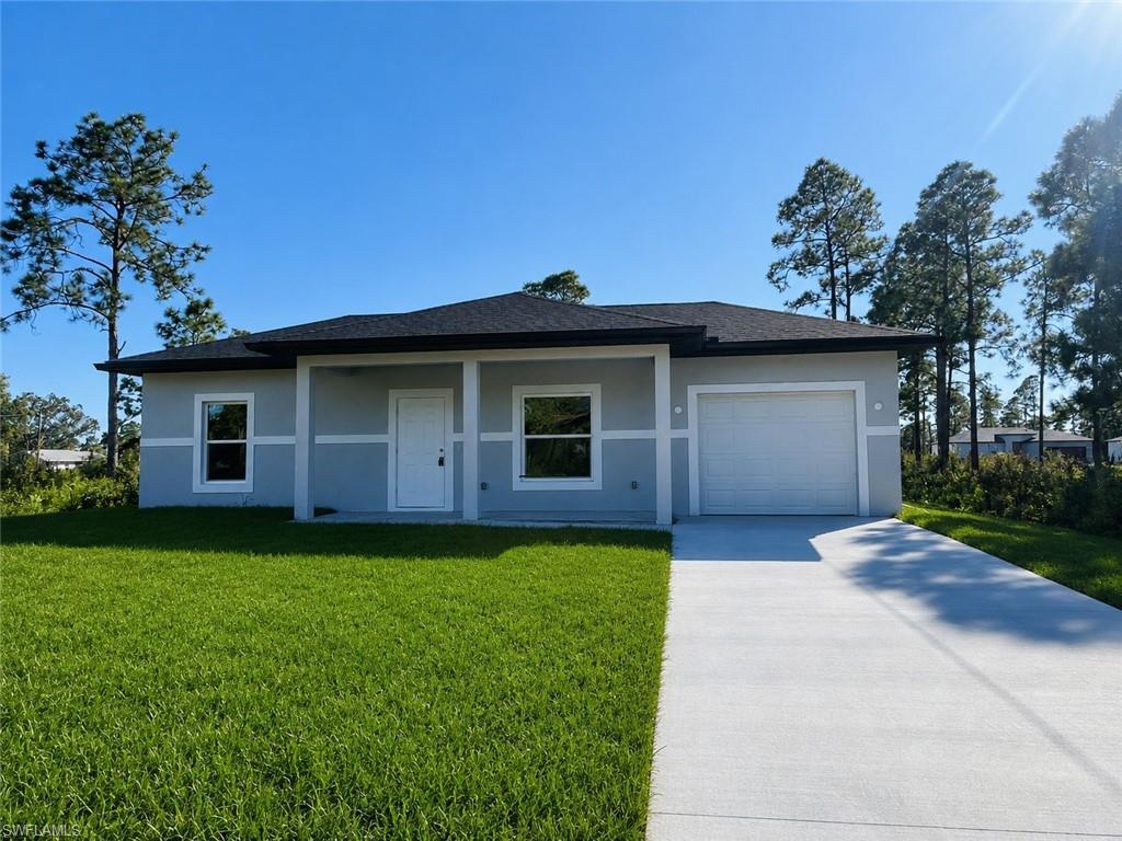 Welcome to this brand new construction in Lehigh Acres, FL, a one-of-a-kind one-bedroom, one-bathroom home with an attached one-car garage. This home is not only one of the lowest-priced new constructions in the area, but it also boasts a host of modern amenities. The kitchen is a chef's dream, complete with stainless steel appliances, granite counters, wood shaker cabinets, and a large peninsula island. There's plenty of storage with numerous cabinets and a pantry. The home features beautiful tile flooring throughout, modern lighting and fixtures, and storm protection-impact windows. The spacious bathroom includes a large tiled shower, and the primary bedroom offers a walk-in closet. The home is pet-friendly and comes with a washer and dryer hook-up. With lots of natural lighting and a clean, modern design, this home is move-in ready. Photos may be of a different but similar unit- for display and marketing purposes only.