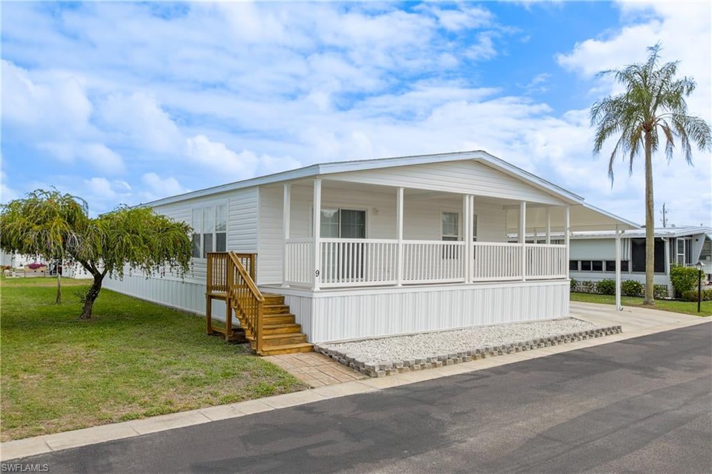 Welcome to Oak Park Village—a highly desirable, resident-owned 55+ riverfront community tucked away in the heart of Alva along the peaceful Caloosahatchee River, offering convenient access to the Gulf. Ideal for those seeking a relaxed, boating lifestyle, this vibrant community features exceptional amenities and a welcoming atmosphere. Residents enjoy low monthly HOA fees that cover essential services including lawn care, water, sewer, and access to a community pool, fitness center, clubhouse, library, and boat launch. Oak Park Village strikes the perfect balance between tranquility and an active social lifestyle. If you're ready to embrace the beauty of riverfront living, this beautifully decorated, fully furnished 2018 manufactured home is a must-see. Offering 3 bedrooms and 2 bathrooms, the home features a spacious open-concept layout connecting the kitchen, dining, and great room areas. Sliding glass doors lead to a large, covered front porch that spans the entire width of the home—perfect for relaxing or entertaining. The kitchen is thoughtfully designed with white GE appliances, including a two-door refrigerator with bottom freezer, electric range with self-cleaning oven and overhead microwave, and dishwasher. Additional highlights include under-cabinet lighting, a large walk-in pantry, and a center island with built-in wine rack and bar seating. The primary suite offers a walk-in closet and an oversized bathroom complete with dual sinks, abundant cabinetry, a garden tub, and a separate shower. The guest bedrooms are comfortably sized, making them ideal for visitors or a home office. Additional features include an indoor washer and dryer, a large storage shed, and a covered carport with a dedicated path for the included golf cart. Conveniently located near the post office, shopping, and dining, the community also offers a weekly shuttle service for groceries and scheduled activities. Optional extra storage is available for just $20 per month for your boat, trailer or RV (first-come, first-served), there is also boat dock space available for lease in it's private marina and a community heliport provides added peace of mind for emergency access and a community bus for outings and shopping trips. Come experience the charm and convenience of waterfront retirement living in Alva—schedule your private showing today!