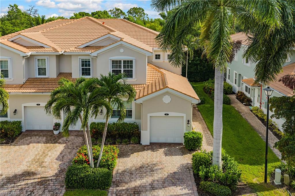 Welcome to Creekside Preserve. Built in 2015 and impeccably maintained, this move-in-ready 2nd floor condo offers a bright & open floor plan with 3 bedrooms plus a den, 2 bathrooms, and over 1,600 square feet of comfortable living space. Surrounded by peaceful wooded views, the home provides a level of privacy rarely found in condominium living. The eastern exposed living room windows offers beautiful bright morning sun while the unit position provides protection from harsh western exposure heat in the evening. Thoughtful upgrades are found throughout, including granite countertops, under cabinet lighting, stainless steel appliances, accordion hurricane shutters on EVERY WINDOW, new no-see-um screens on the lanai and ALL window screens, color sealed grout throughout, luxury vinyl flooring in the bedrooms, stylish feature walls, and custom high-end closet systems in each bedroom and the pantry. Major systems and appliances have been updated with a dishwasher replaced in 2020, air handler in 2021, AC condenser in 2023, a brand-new impact rated front door in 2023, and a hot water heater in 2023. The building was also completely repainted by the HOA in 2026. Residents enjoy access to a beautifully maintained lakefront pool, clubhouse, and fitness center. Conveniently located near a wide variety of shopping and dining options with easy access to Coconut Point, Miromar Outlets, I-75, RSW International Airport, and our world-famous beaches, you’ll enjoy the lifestyle offered here. This exceptional condo is one of the best values available on the market today. Act fast!
