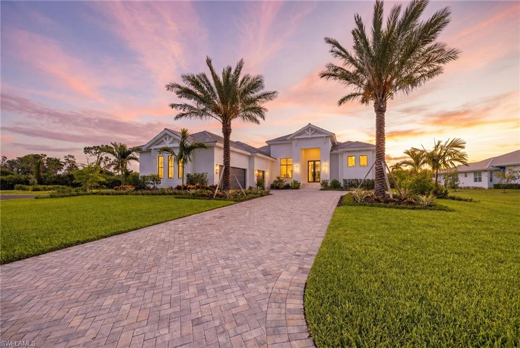 Stunning New Construction in Gated Devonwood, Fort Myers. Welcome to this exquisite new construction estate in the exclusive, gated community of Devonwood. Built in 2026, this 4-bedroom + den, 6-bath (4 full, 2 half) masterpiece offers 3,768 sq ft of architecturally designed living space (6,455 sq ft total) on a private .91 acre oversized homesite. Step through impact-resistant, picture, and transom windows into a light-filled great room floor plan with soaring beamed ceilings, wide-plank wood flooring, and a striking mix of designer finishes throughout. The chef's kitchen is a showstopper, featuring a massive waterfall-edge island, custom cabinetry, gas cooktop, and a walk-in pantry, all flowing seamlessly into the dining and living areas for effortless entertaining. The primary suite is a private retreat with dual sinks, a separate soaking tub, walk-in shower, and generous walk-in closet. A den/study and screened lanai/porch round out the thoughtful layout, while a 3-car garage and paved driveway offer ample parking. Outdoor living shines with a heated, saltwater pool and spa, outdoor kitchen, fireplace, and shower, all set beneath a screened lanai overlooking the beautifully landscaped grounds. Additional highlights include impact-resistant doors, storm shutters, a whole-home generator-ready propane system, tankless water heater, and top-tier security features. Devonwood residents enjoy an amenities such as: community boat dock, boat ramp, and Gulf access, tennis courts, basketball, picnic and BBQ area, all just minutes from Fort Myers' best dining, shopping, and beaches. A rare opportunity to own a brand-new estate in one of Fort Myers' most coveted gated communities.