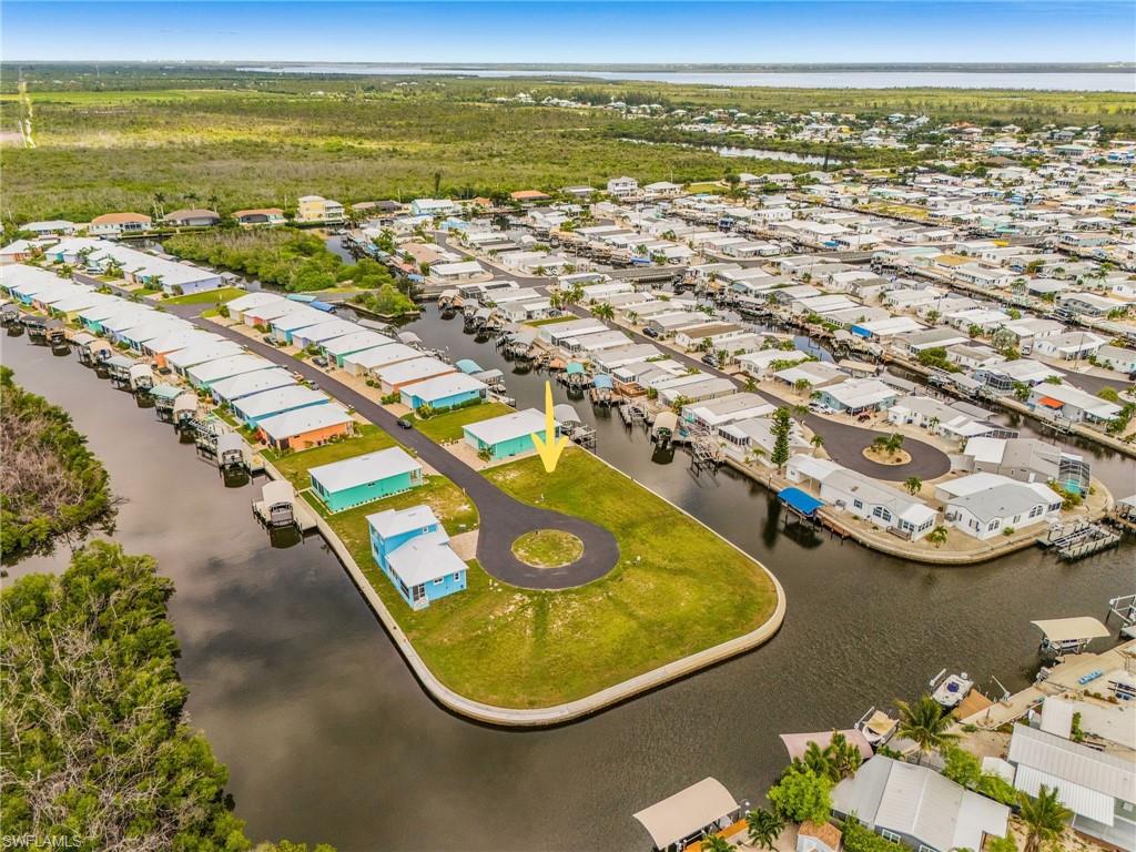 Discover Treasure Cove, Pine Island’s newest waterfront community, with fast, deep-water access to San Carlos Bay and the Gulf of Mexico. Designed with boaters in mind, Treasure Cove offers an exceptional location for fishing, cruising, and enjoying the Southwest Florida waterfront lifestyle. YOU MUST CHECK OUT THE VIDEO FLYOVER IN THE VIRTUAL TOUR. The community features low HOA fees, central water and sewer, and new homes built to today’s elevation standards to help reduce flood risk. Choose a complete home-and-lot package or purchase your waterfront homesite separately and build when you’re ready—there is no required timeline to begin construction. All home plans are subject to HOA approval. Secure your place in this new Pine Island waterfront community and start planning the home—and boating lifestyle—you’ve been waiting for.
