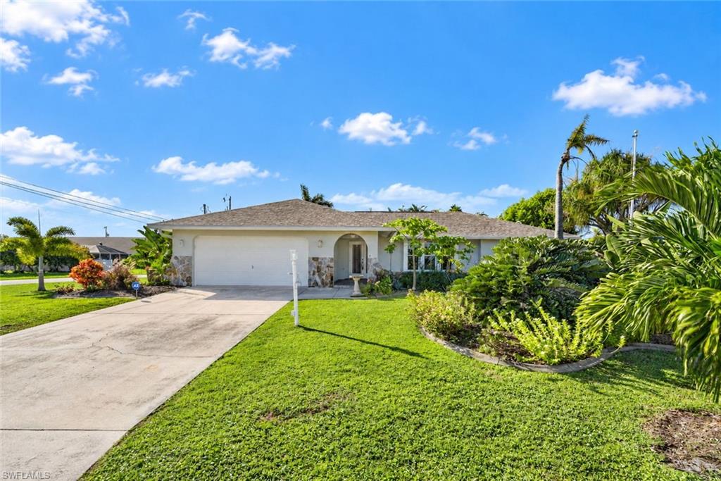YOUR PRIVATE FLORIDA OASIS IS WAITING! 
Imagine coming home to your own slice of paradise! This inviting 3-bedroom, 2-bathroom home in Cape Coral sits on a desirable corner triple lot, offering extra outdoor space, beautiful landscaping, and fruit trees that bring the charm of Florida living right to your doorstep.
Step outside and enjoy the beauty of the lush surroundings, pick fresh fruit, entertain friends and family, or unwind in the included Jacuzzi after a long day. Inside, updated appliances and comfortable living spaces make this home an exciting opportunity to create the lifestyle you’ve been dreaming of. An attached two-car garage adds everyday convenience.
The spacious outdoor setting offers endless possibilities to personalize your property, create your dream garden, or design an inviting outdoor entertaining area. Whether you’re searching for your next home, a Florida getaway, or a property with room to make your own, this is an opportunity worth exploring!
WHY JUST DREAM ABOUT THE FLORIDA LIFESTYLE WHEN YOU CAN LIVE IT?
Properties with a triple lot, beautiful landscaping, and your own backyard retreat are worth a closer look. Don’t let this opportunity pass you by! Call today, schedule your private showing, and come experience the possibilities for yourself. Your Cape Coral oasis may be waiting right here!