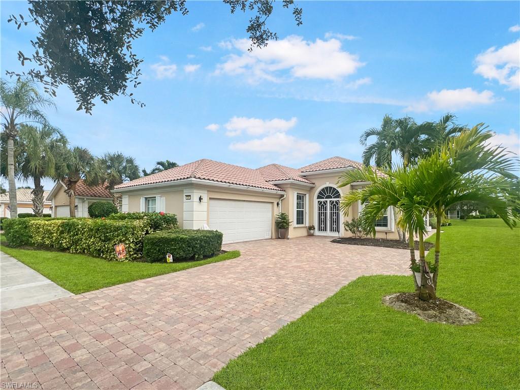 OVERSIZED LAKEFRONT LOT, STUNNING WATER VIEWS & PRIVATE HEATED SALTWATER POOL! Discover exceptional Southwest Florida living in this beautifully maintained Oakmont model located in the highly desirable gated community of Verona Walk! Perfectly positioned on an oversized lot with expansive lake views, this beautiful 3-bedroom plus den, 2-bath home offers an inviting open floor plan, abundant natural light, and a spectacular outdoor setting designed for year-round enjoyment.  Step outside to your private screened lanai featuring a sparkling saltwater pool equipped with both solar and electric heating, providing year-round comfort while overlooking the peaceful lake. Whether enjoying your morning coffee, soaking up the Florida sunshine, or entertaining family and friends, this outdoor retreat is truly the highlight of the home.  Inside, the spacious kitchen features granite countertops, stainless steel appliances, and ample cabinetry, opening to comfortable living and entertaining spaces. The generously sized primary suite offers a walk-in closet and an impressive ensuite bathroom featuring dual sinks, an oversized soaking tub, a multi-jet shower, and two separate toilet areas for added privacy and convenience. A versatile den provides additional flexibility for a home office, guest space, or hobby room.  Numerous valuable improvements include a new A/C condenser and air handler (2019), blown-in fiberglass insulation (2022), solar and electric pool heating systems (2022), Pentair pool pump, filtration and saltwater system (2022), Rollsecure accordion and electric storm shutters (2021), UV light air handler cleaner (2021), updated LED recessed lighting (2021), water heater (2021), and a resurfaced garage floor.  Verona Walk offers an exceptional resort-style lifestyle with a beautiful town center, clubhouse, fitness center, resort-style pools, tennis, pickleball, and an array of recreational activities. Ideally situated with convenient access to downtown Naples, Marco Island, pristine Gulf beaches, shopping, and dining.